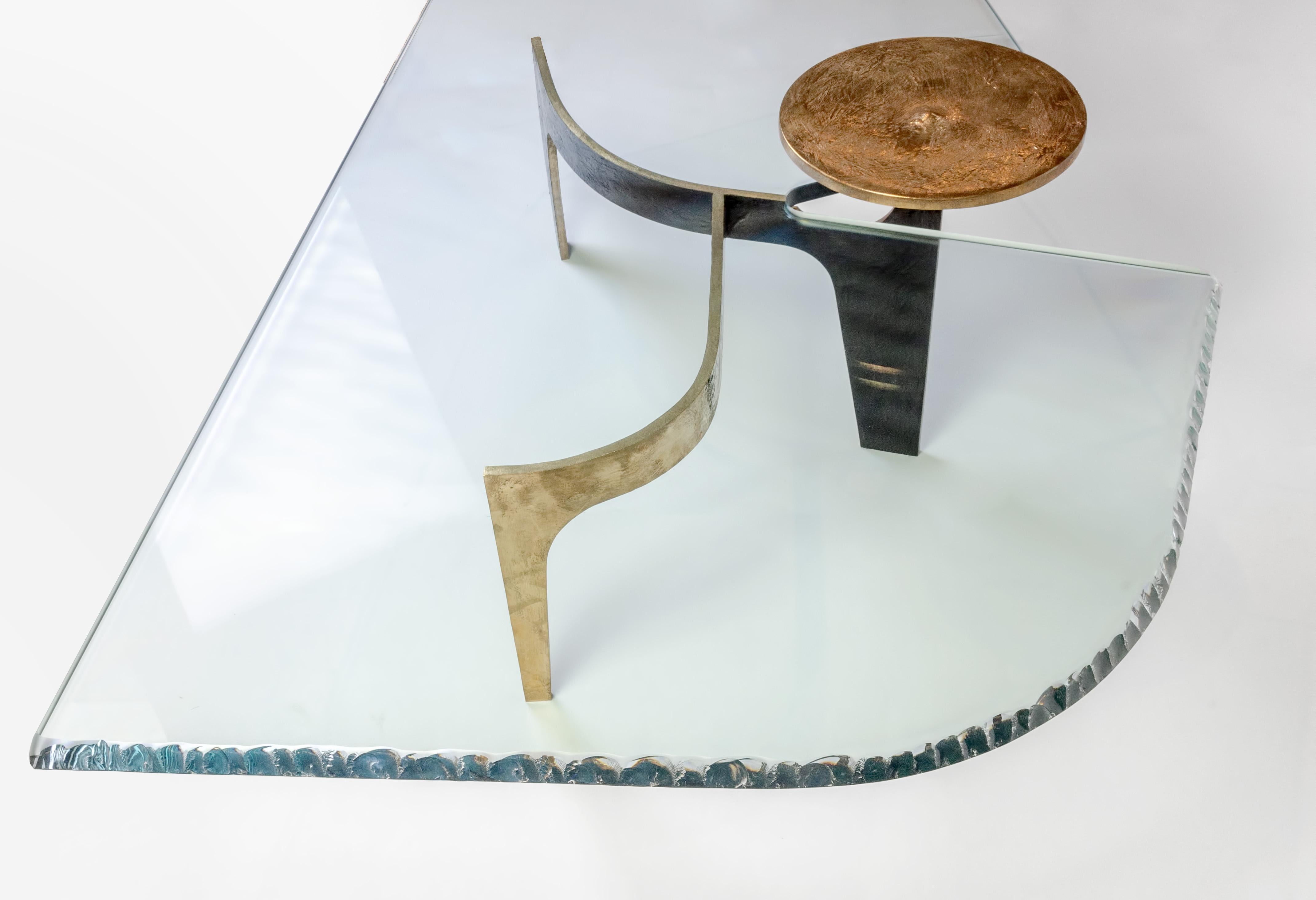 Achille Salvagni
Ares
2017
The Ares coffee table is a sculptural study executed with a natural hand-engraved and burnished finish cast bronze structure and a glass top. The table's simple form was inspired by Ares, the Greek god of war, son of