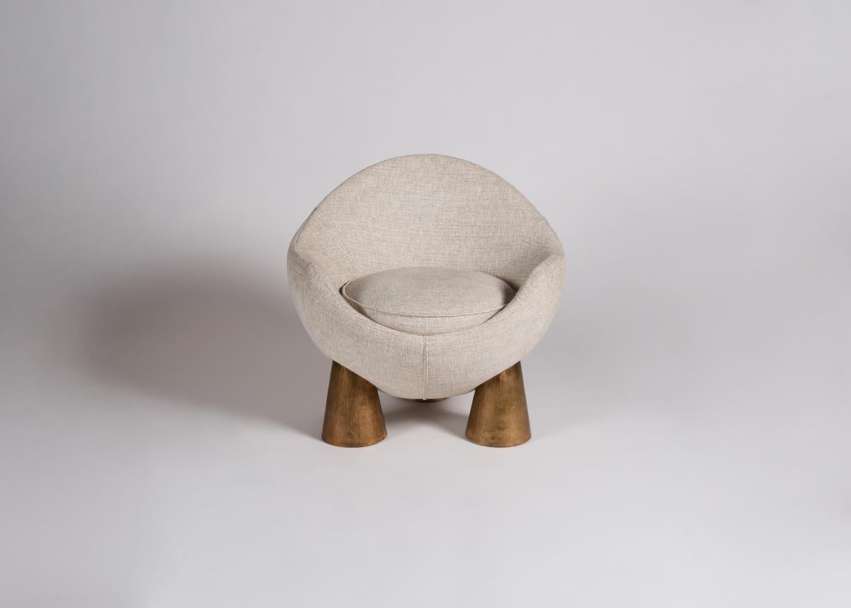 The result of artistic study into form, volume and geometry, Salvagni sought to fuse a sphere with conical shaped legs, carving out the sphere to create the seat and backrest of this engaging armchair.