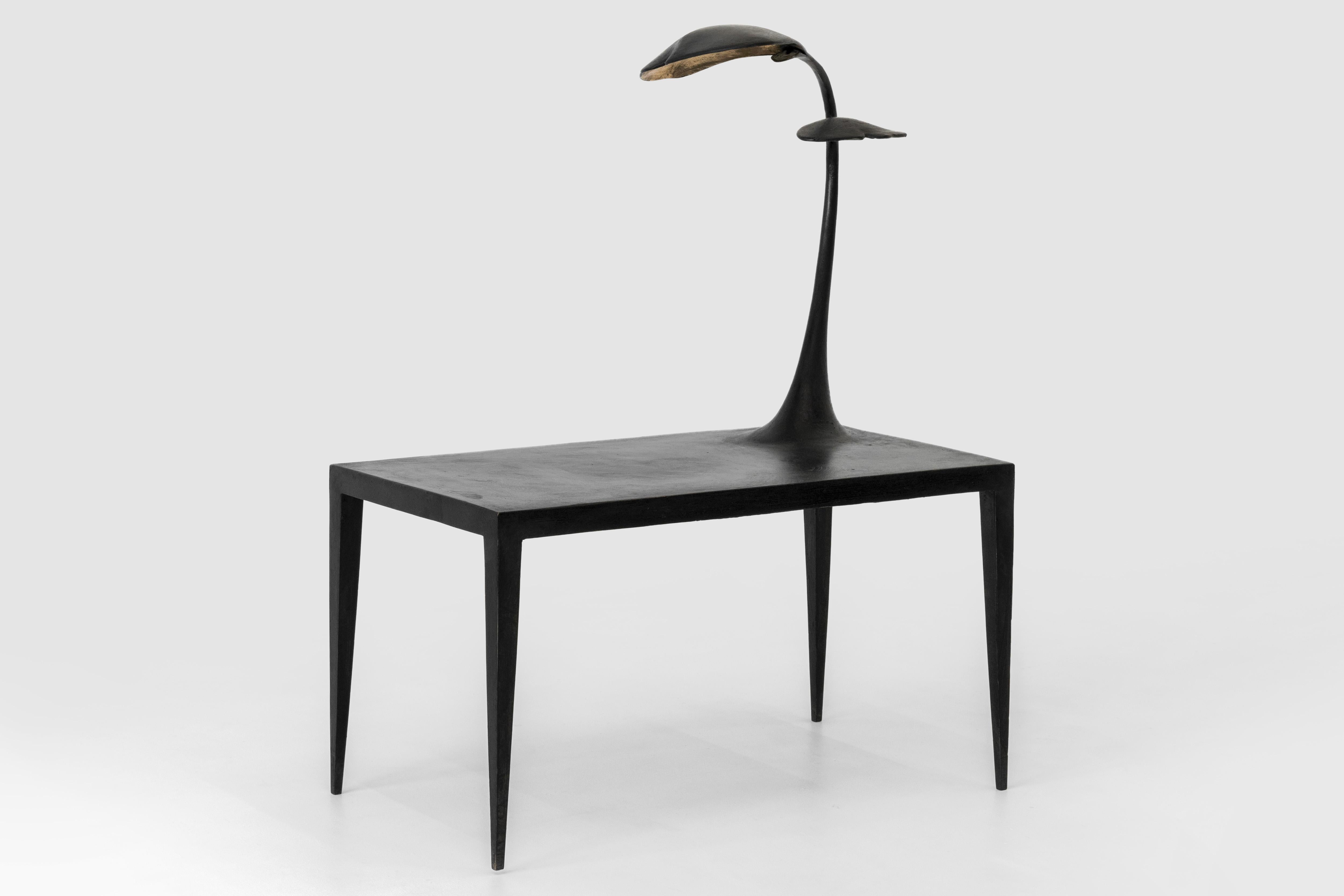 This side table is a tribute to Swedish botanist Carl Linnaeus, whose work contributed to our understanding of Ginkgo tree. The shape of the light fitting on the side table is an abstraction of the Ginkgo foliage, a symbol for health and a life of