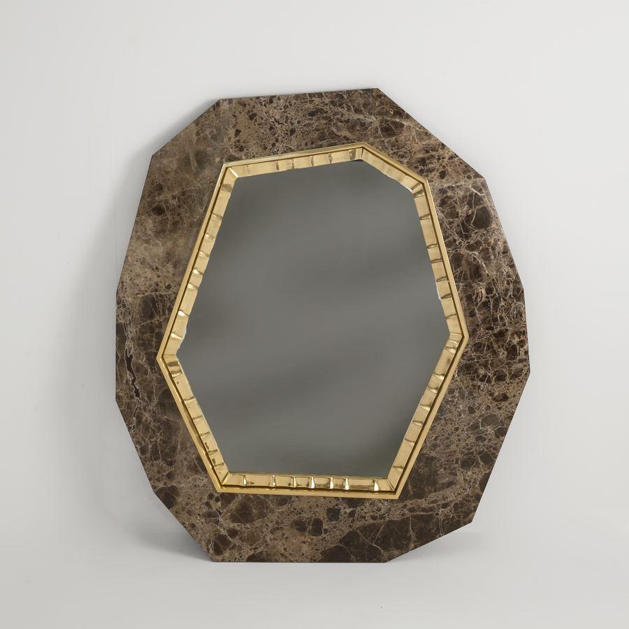 Lucy is a hexagonal mirror set, like a jewel, in a facetted plaque (either of noir doré marble, brown Emperador marble, or polished Royal Oak), and bordered by thin ornamental patinated bronze trim.

Edition of 20.
Stamped: Achille Salvagni