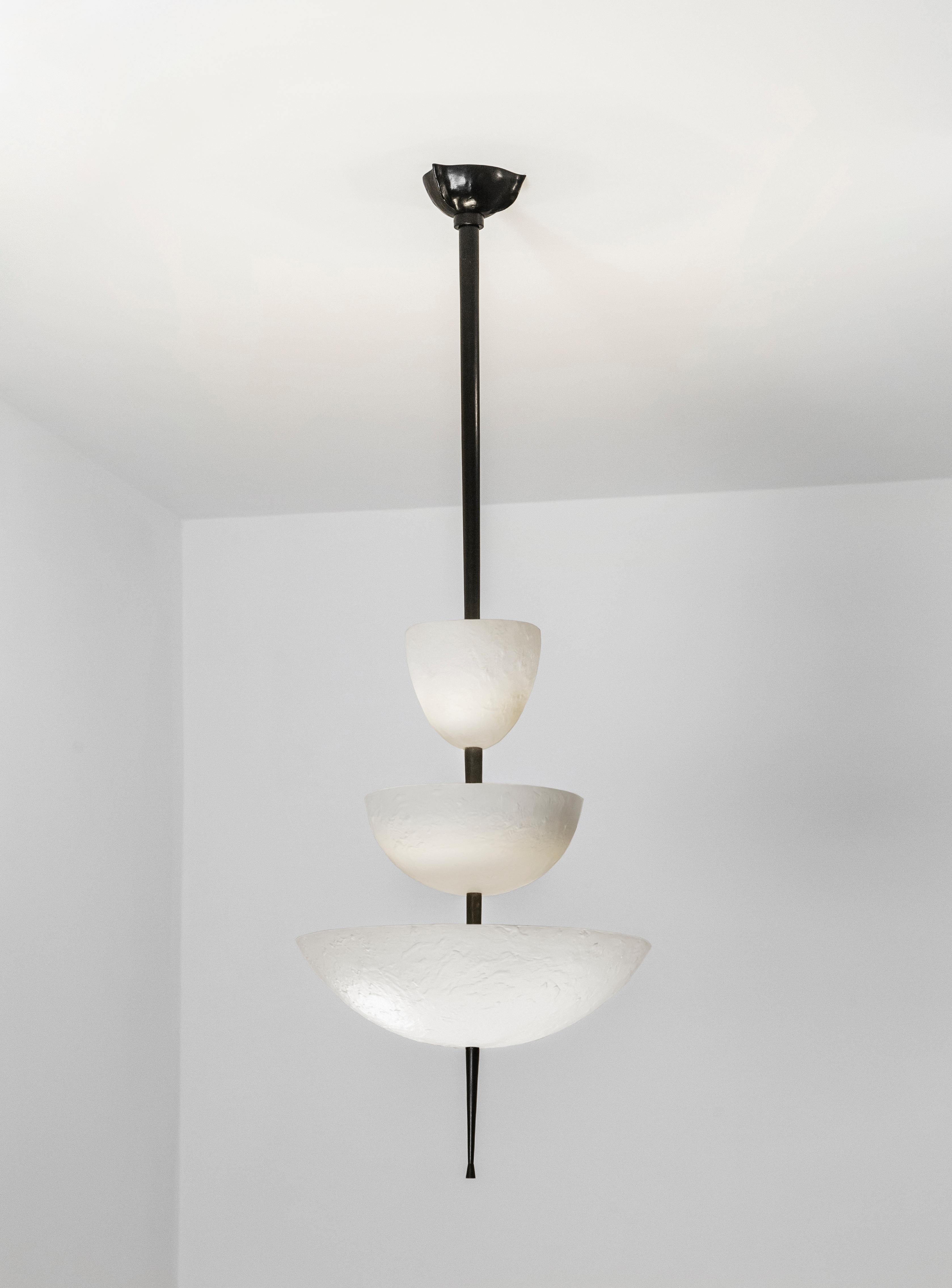 Achille Salvagni
Simposio white chandelier
2017
Cast bronze chandelier in a white finish with burnished bronze stem. This chandelier is named after Plato's Symposium, a praise to Eros, God of Love and Desire, and its unique texture is inspired by