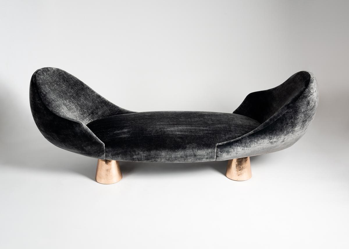 Tête à Tête is a beautiful new chaise lounge by the architect and designer Achille Salvagni. This extra long piece features the Roman's signature retinue of stunning attributes - ultra plush upholstery, an elegant asymmetry, and conical feet of