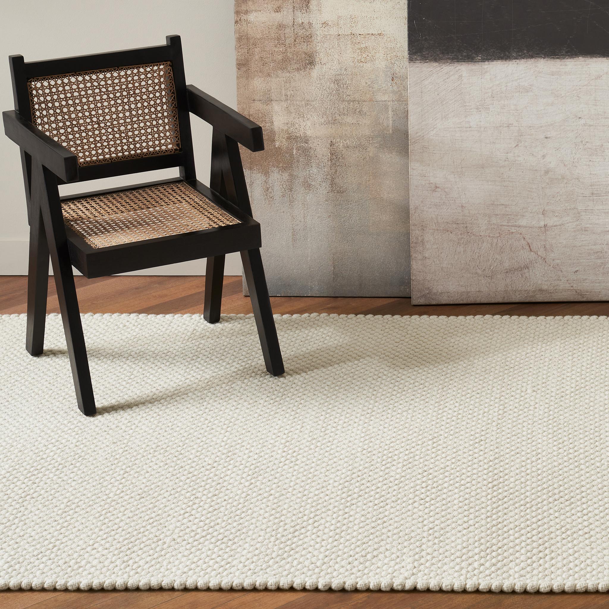 Acia finds its inspiration in the raveled roots, mimicking this web through its intricate cotton overlay. Protectively beneath, lies softly felted 100% undyed New Zealand and Mediterranean wools, reminding us that sometimes there is an abundance of