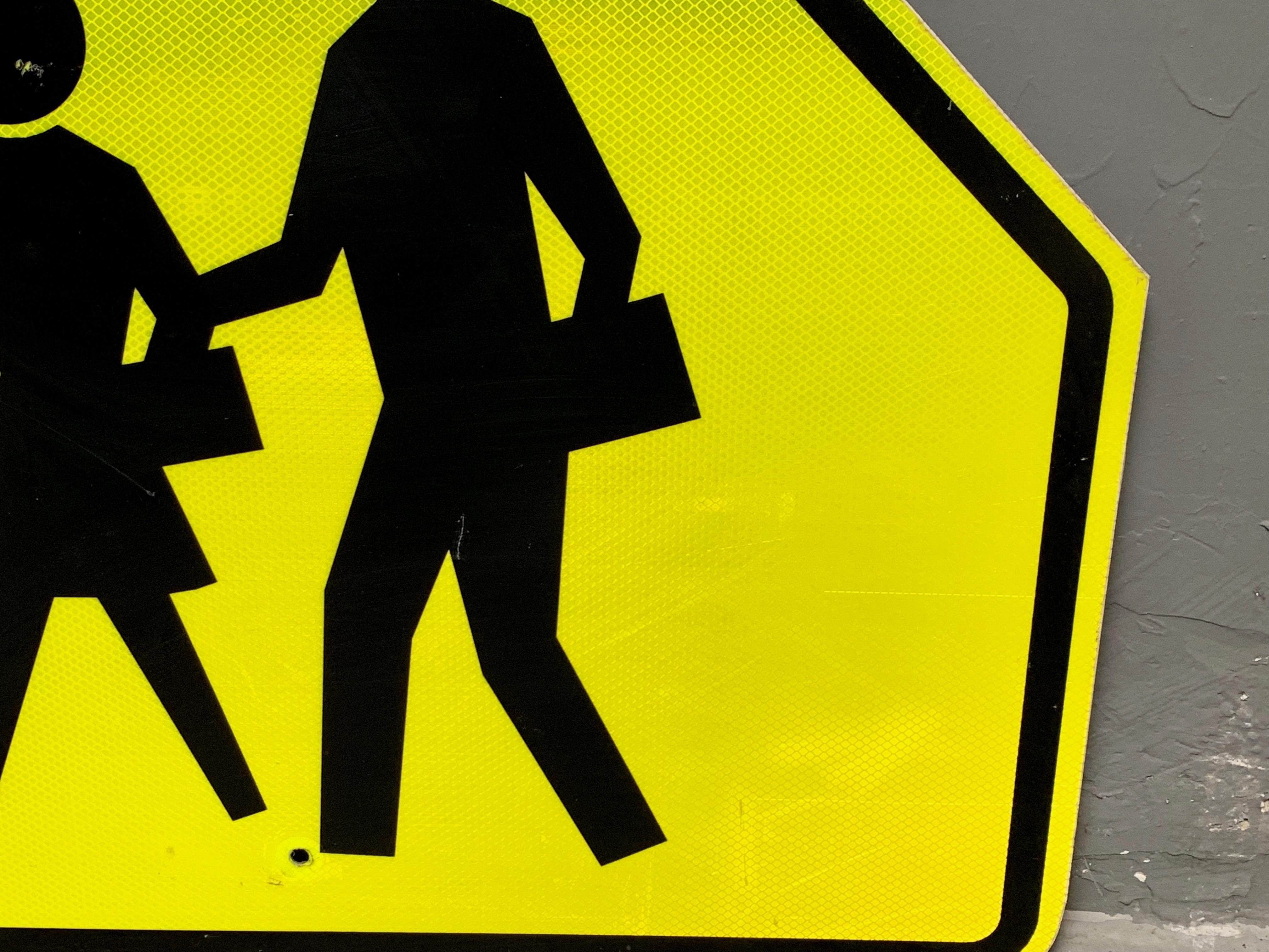 2 people walking sign