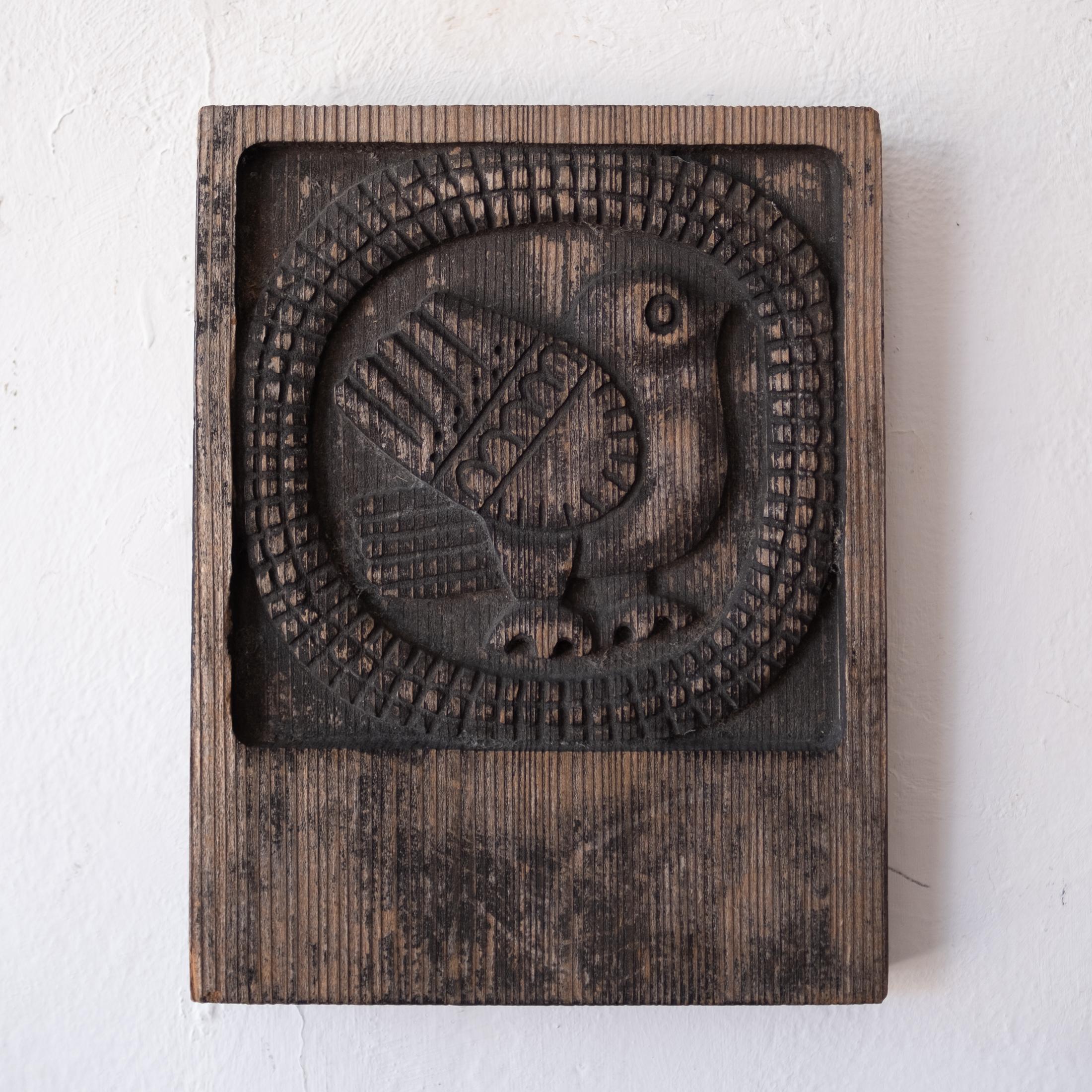Sculptural wood wall plaque by Evelyn Ackerman for her and Jerome Ackerman's company, ERA. It has a wonderful patina and includes a hanging bracket on the back. 

Evelyn Ackerman was born on January 12, 1924 in Detroit, Michigan. She graduated