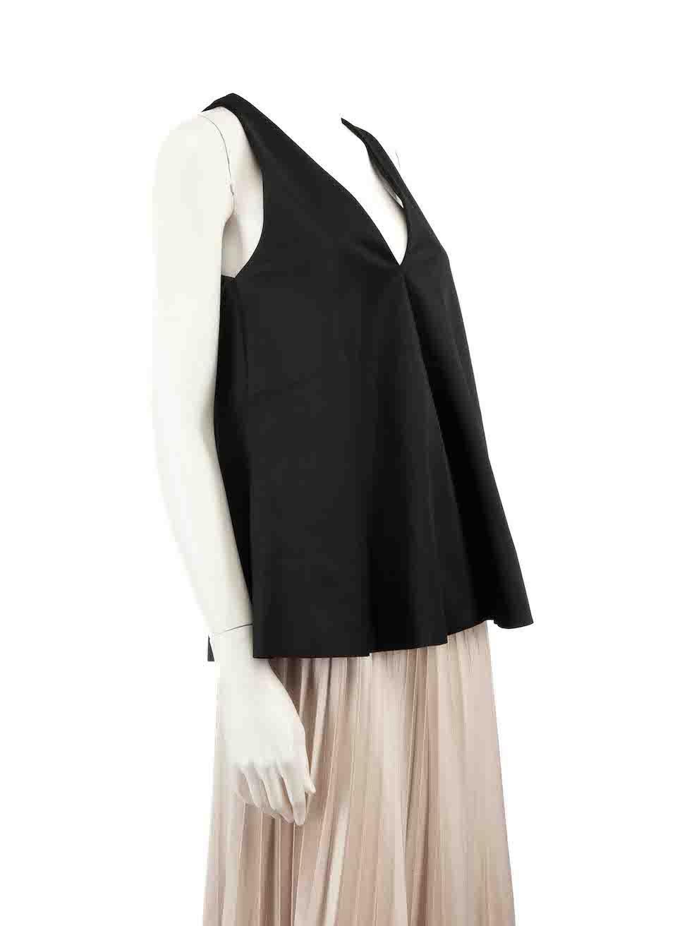 CONDITION is Very good. Hardly any visible wear to top is evident on this used Acler designer resale item.
 
 
 
 Details
 
 
 Black
 
 Polyester
 
 Trapeze top
 
 Sleeveless
 
 V-neck
 
 
 
 
 
 Made in China
 
 
 
 Composition
 
 100% Polyester
 
