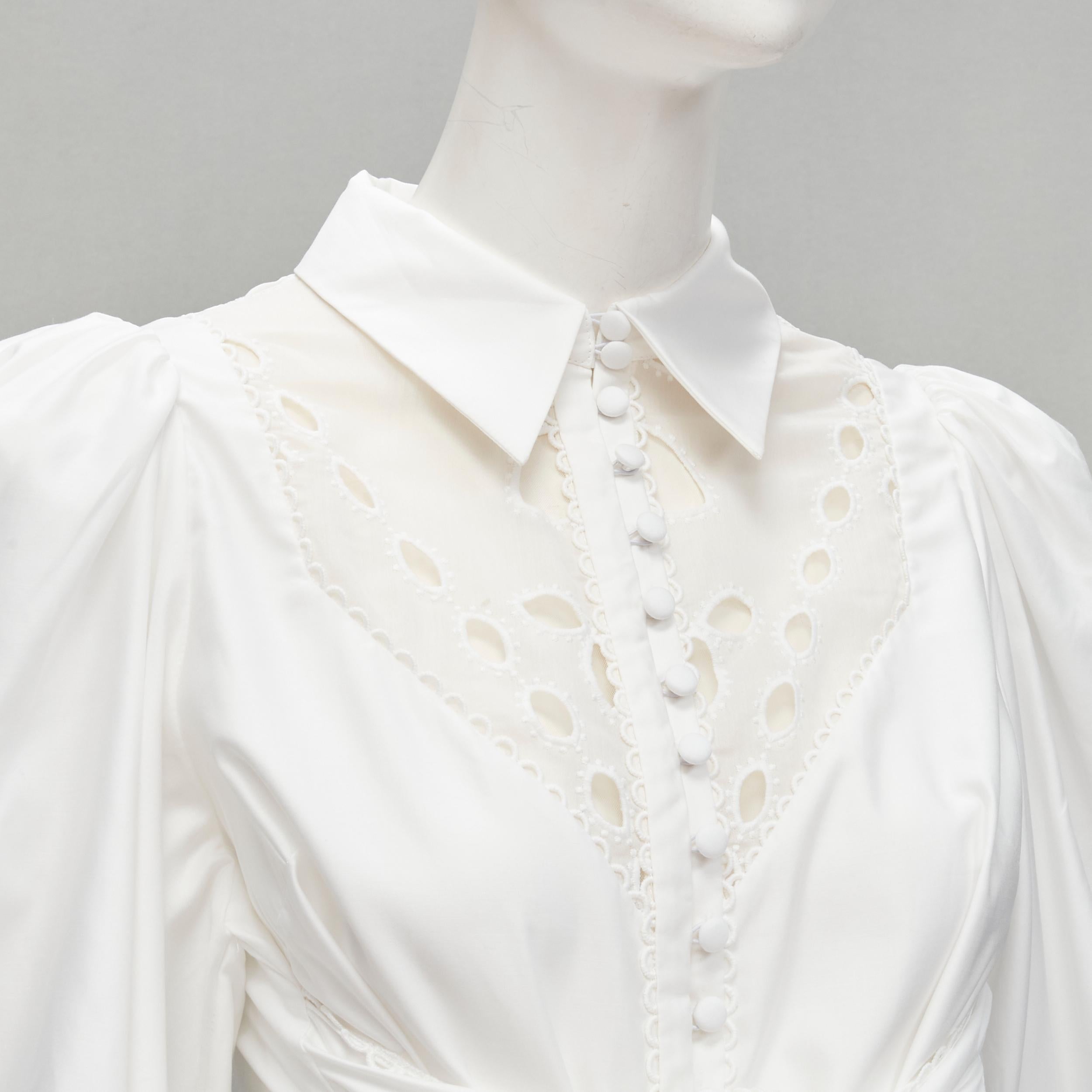 ACLER white cotton eyelet cutout big bow puff sleeve blouse US2 S
Reference: AAWC/A00274
Brand: Acler
Material: Cotton
Color: White
Pattern: Solid
Closure: Button
Extra Details: Row of button closure at neck may need time to finish.
Made in: