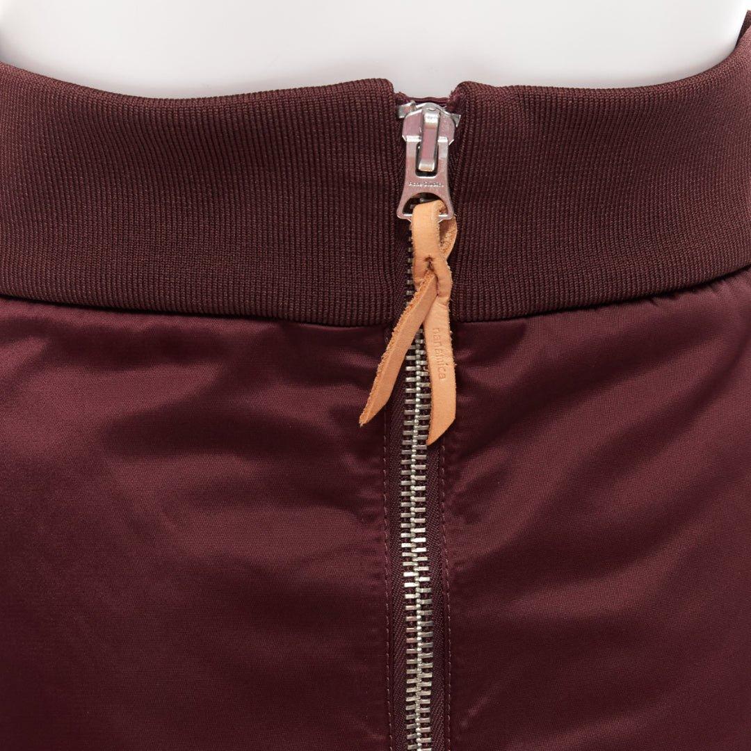 ACNE STUDIOS 2015 Pag Bomber jupe trapèze rembourrée en nylon violet prune FR34 XS
Référence : NKLL/A00041
Marque : Acne Studios
Modèle : Bombardier Pag
Collection : 2015
Matière : Nylon, mélange
Couleur : violet, marron
Motif : Solide
Fermeture :