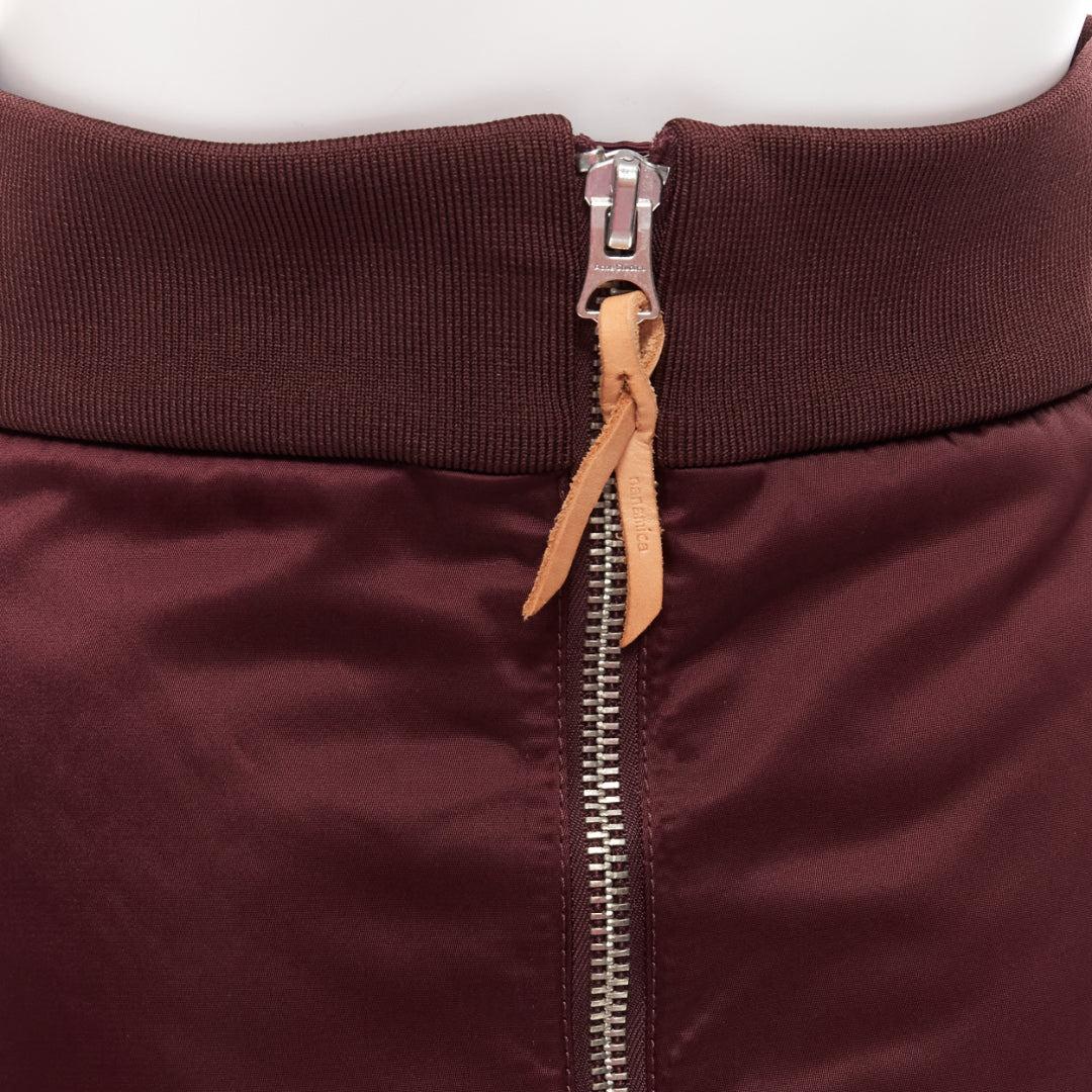 ACNE STUDIOS 2015 Pag Bomber plum purple nylon padded A-line skirt FR34 XS
Reference: NKLL/A00041
Brand: Acne Studios
Model: Pag Bomber
Collection: 2015
Material: Nylon, Blend
Color: Purple, Brown
Pattern: Solid
Closure: Zip
Lining: Gold