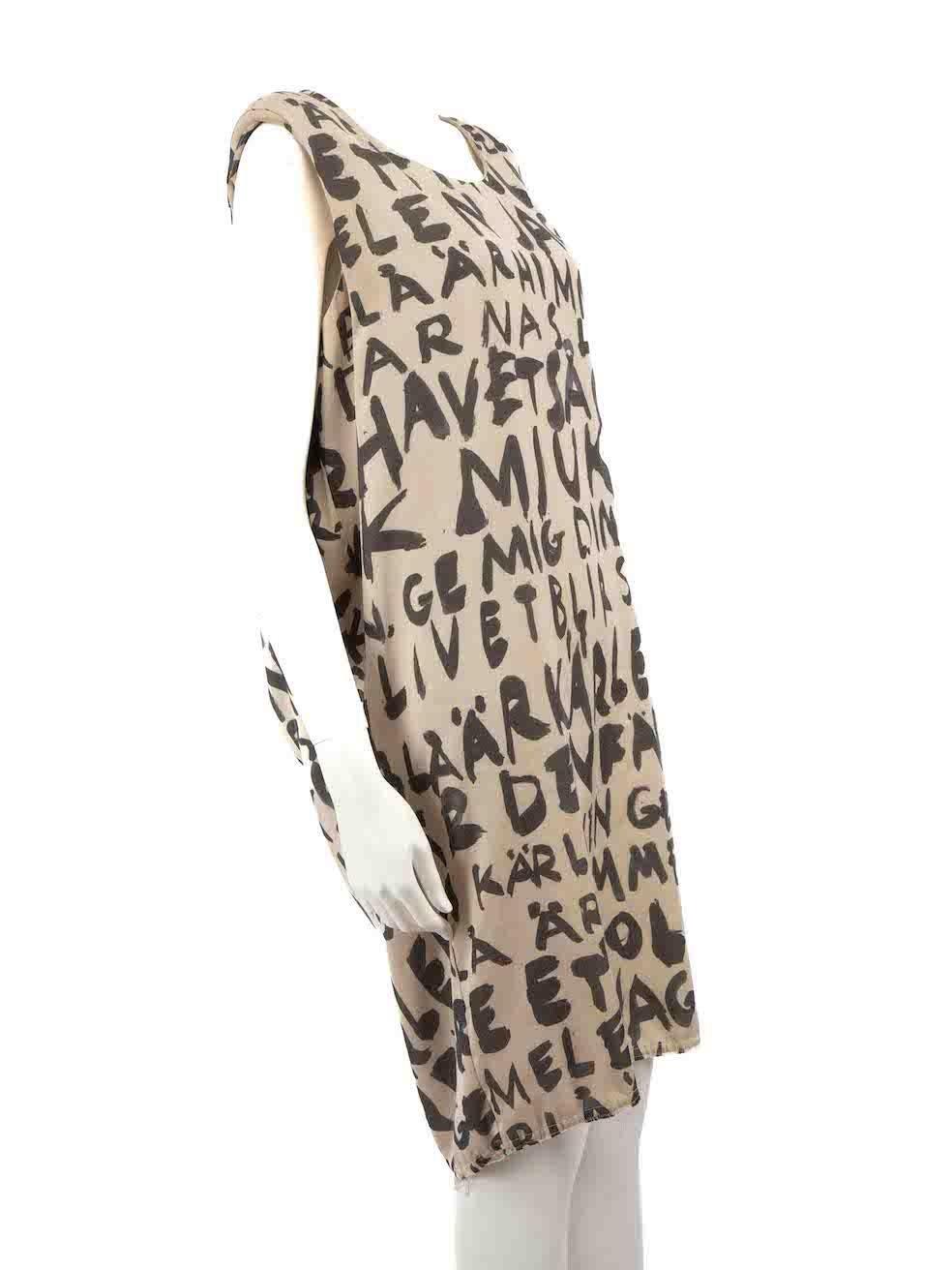 CONDITION is Very good. Minimal wear to dress is evident. Minimal wear to the right underarm with light marks on this used Acne Studios designer resale item.
 
 
 
 Details
 
 
 Beige
 
 Polyester
 
 Shift dress
 
 Lettering print
 
 Sleeveless
 
