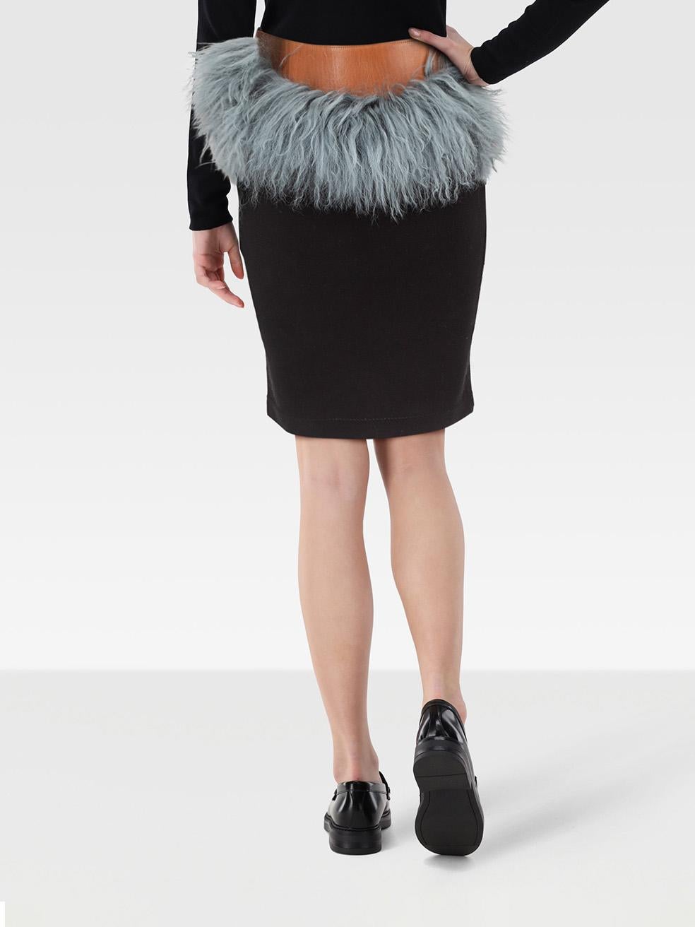 CONDITION is Very good. Minimal wear to the skirt is evident. Abrasion on the front and back of the leather waist band on this used Acne Studios designer resale item.
 
 
 
 Details
 
 
 Black
 
 Viscose
 
 Skirt
 
 Blue lamb shearling trim
 
 Brown
