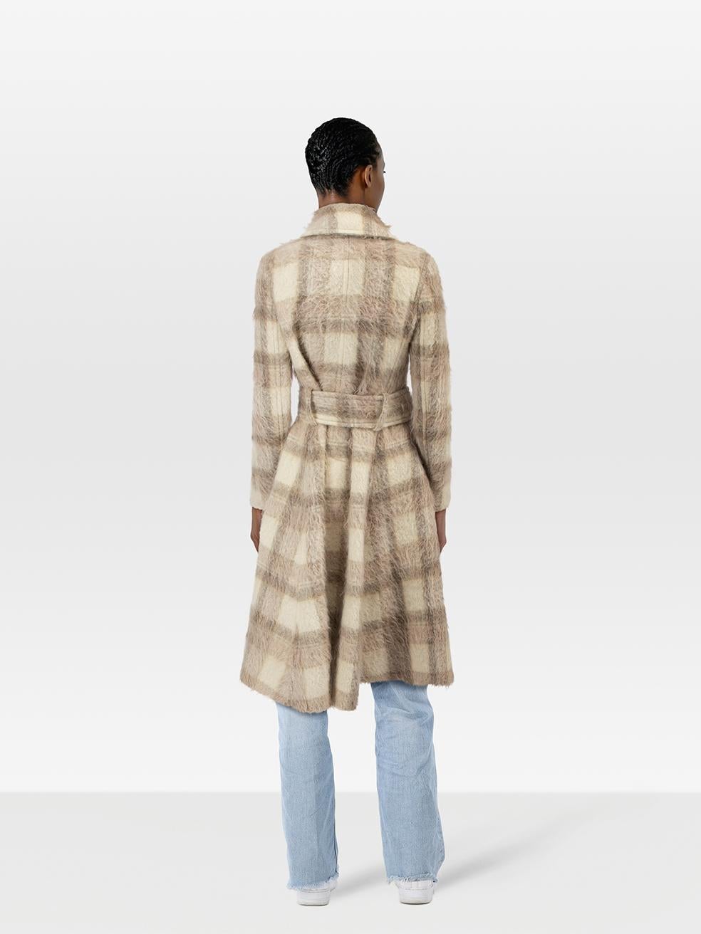 CONDITION is Very Good. Minimal wear to the coat is evident. One button is partly detached on this used Acne Studios designer resale item.
 
 
 
 Details
 
 
 Ecru
 
 Wool
 
 Coat
 
 Checkered pattern
 
 Long length
 
 Long sleeves
 
 Single