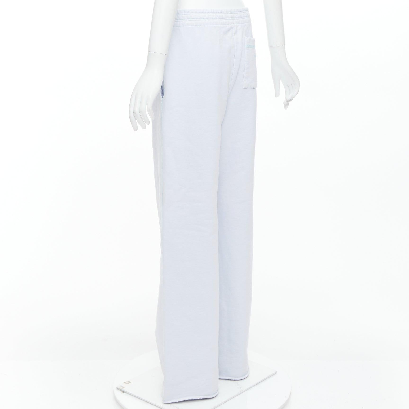Pantalon de survêtement en coton à coutures contrastées bleu clair de ACNE STUDIOS M en vente 1