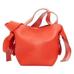ACNE STUDIOS Musubi Mini red smooth leather ribbon side top handle bag