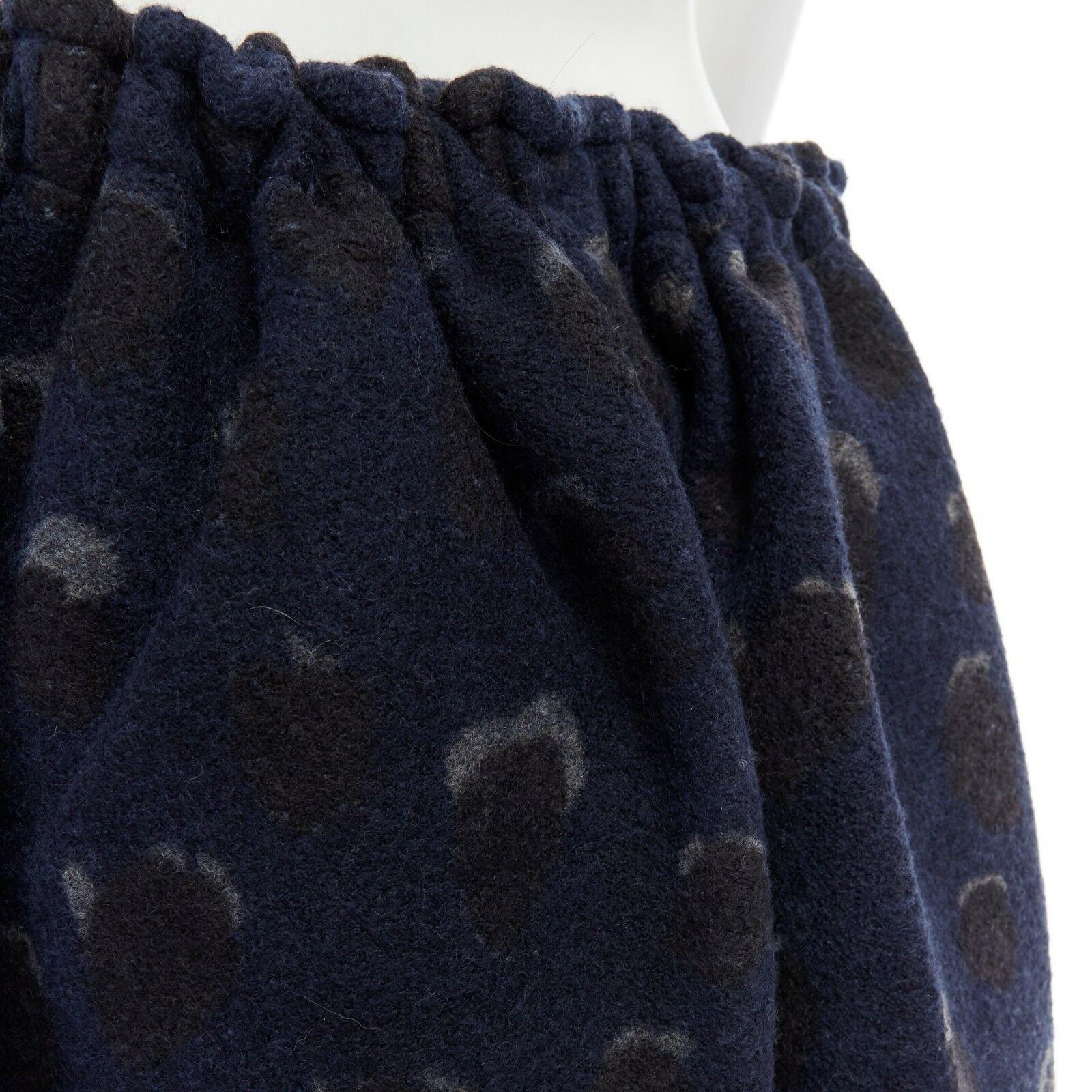 ACNE STUDIOS navy blue spot wool dropped crotch flared culotte pants FR36 S 
Reference: JETI/A00125 
Brand: Acne Studios 
Material: Unknown 
Color: Blue 
Pattern: Polka Dot 
Closure: Drawstring 
Extra Detail: Feels like wool. Navy blue with grey and