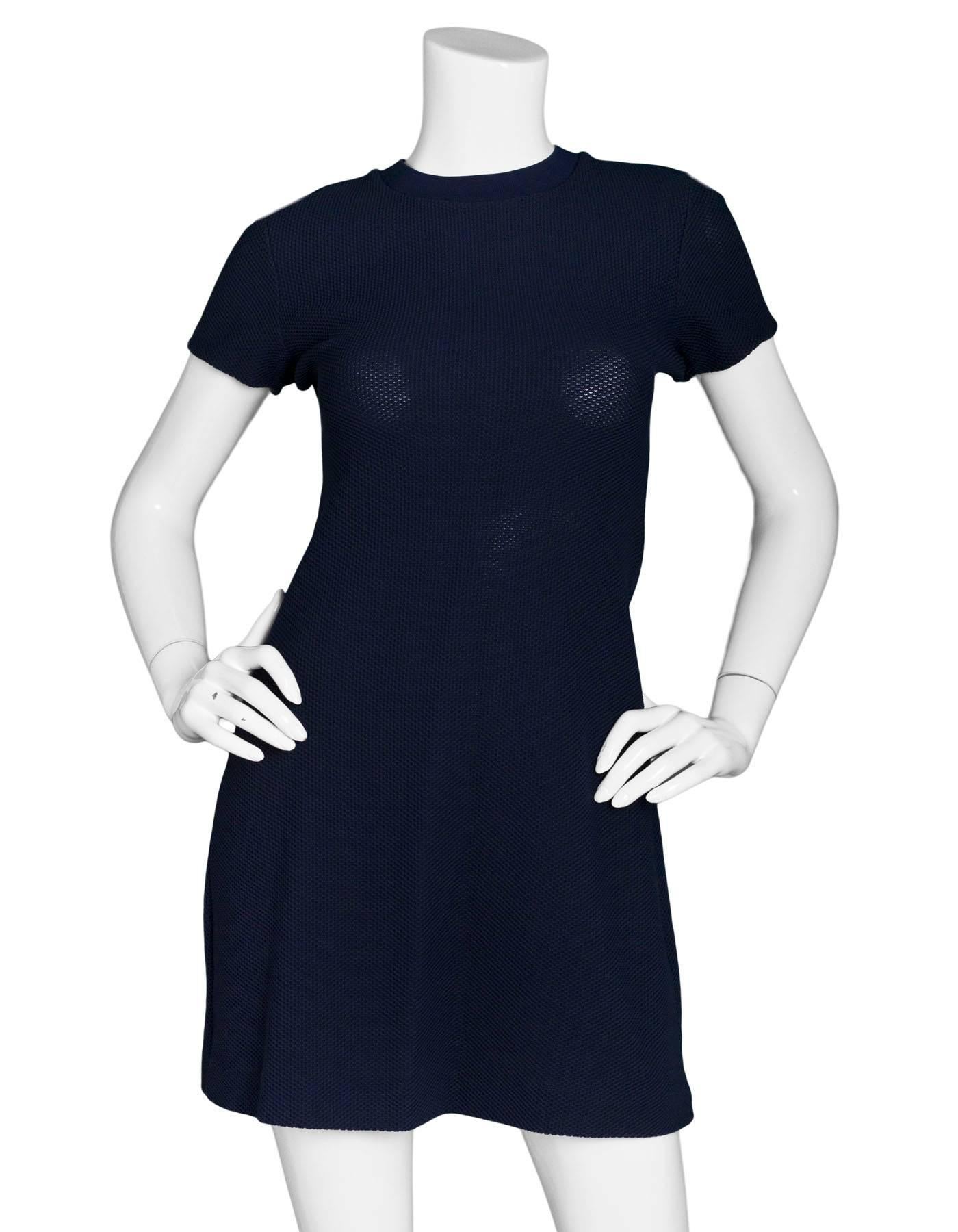 Acne Studios Navy Dress

Made In: Portugal
Color: Navy
Composition: Not listed, feels like cotton blend
Closure/Opening: Pull-over
Exterior Pockets: None
Interior Pockets: None
Overall Condition: Excellent pre-owne condition with the exception of