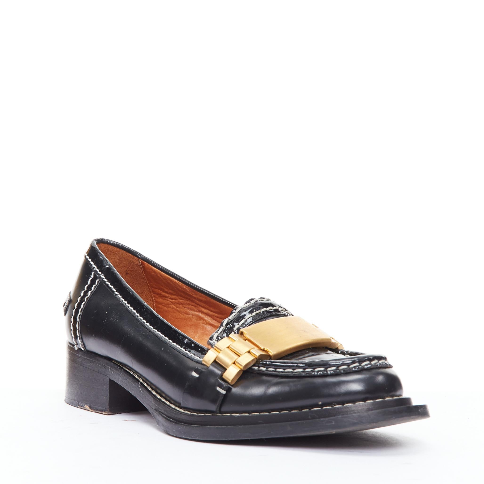 ACNE STUDIOS Mocasines con pespunte negro y hebilla dorada EU38 Negro en venta