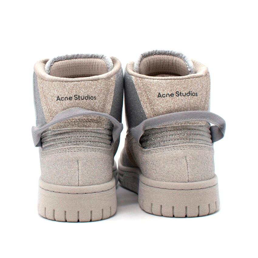 silver high top sneakers