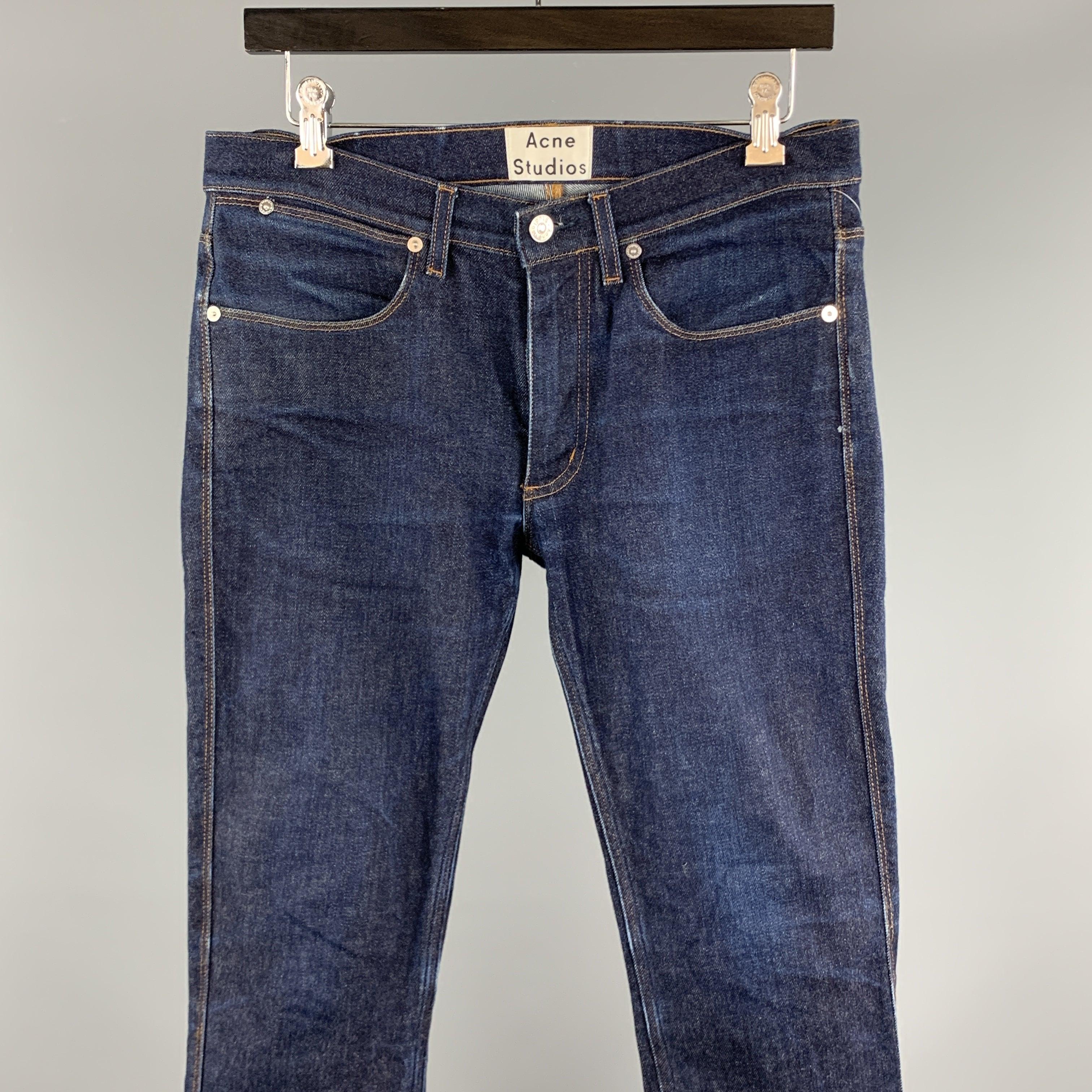 ACNE STUDIOS Jeans comes in a indigo cotton featuring contrast stitching and a zip fly closure. Made in Italy.
 Excellent
 Pre-Owned Condition. 
 

 Marked:  31 x 32 
 

 Measurements: 
  Waist: 31 inches 
 Rise: 8 inches 
 Inseam: 32 inches 
  
  
