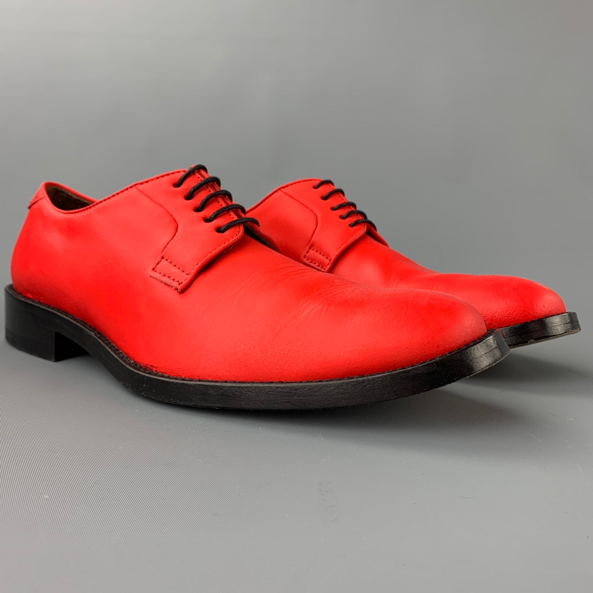 ACNE STUDIOS shoes comes in a red leather featuring a cap toe, wooden sole, and a lace up closure. Moderate wear. Made in Italy.

Good Pre-Owned Condition.
Marked: EU 42

Outsole: 

12 in. x 4 in. 

