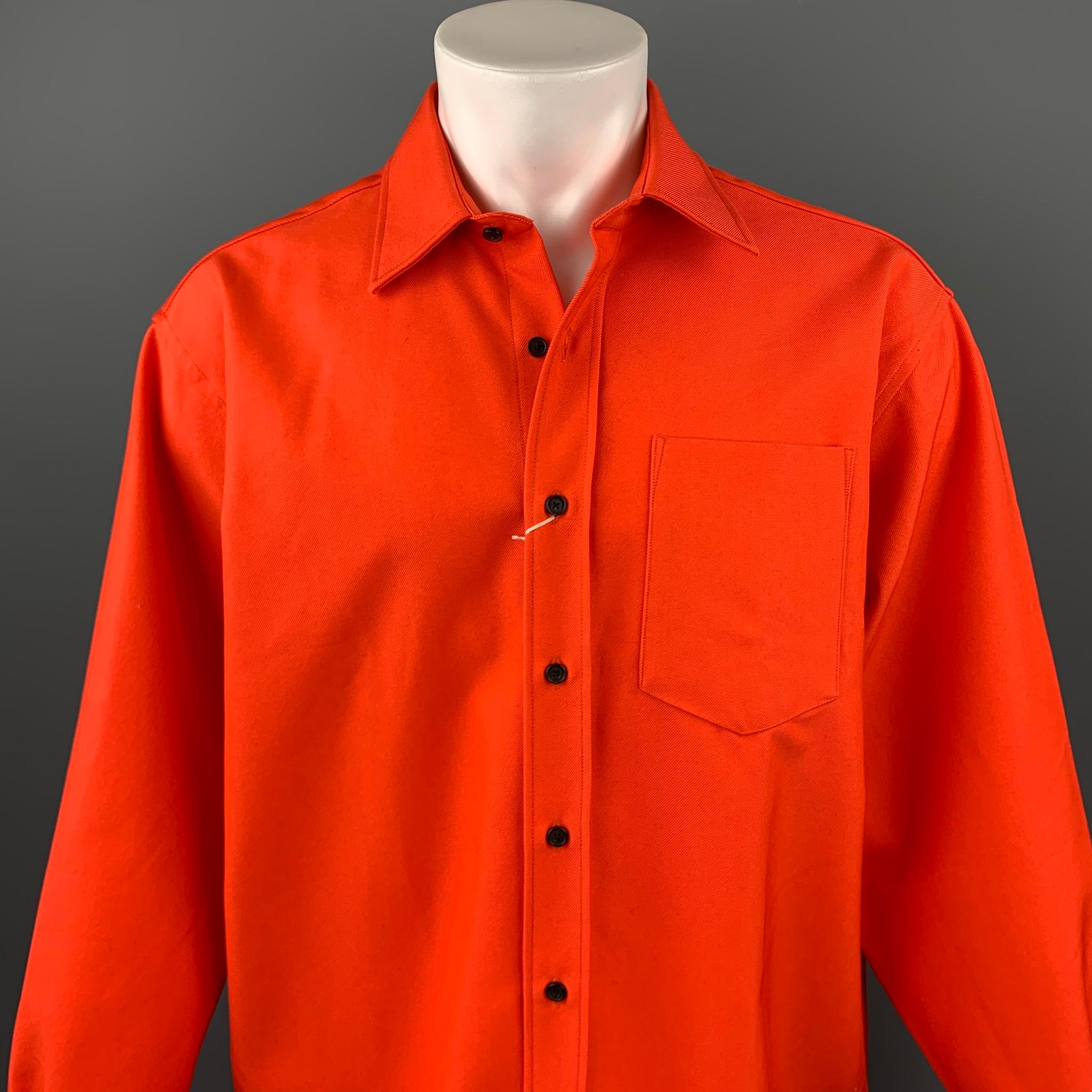 ACNE STUDIOS long sleeve shirt comes in a orange cotton / polyester featuring a oversized style, front patch pocket, spread collar, and a button up closure. 

New With Tags.
Marked: 48

Measurements:

Shoulder: 21 in. 
Chest: 52 in. 
Sleeve: 25.5