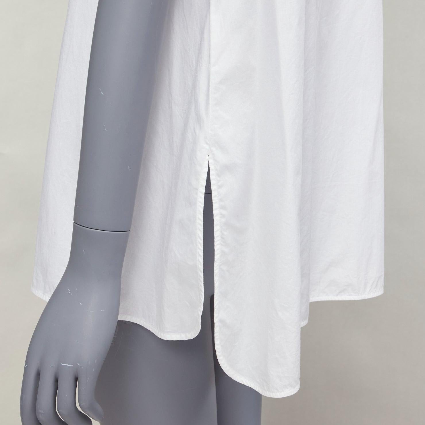 ACNE STUDIOS white cotton minimal sleeveless side slits tunic top FR36 S
Reference: NKLL/A00166
Brand: Acne Studios
Material: Cotton
Color: White
Pattern: Solid
Closure: Button
Extra Details: Side slits.
Made in: Portugal

CONDITION:
Condition: