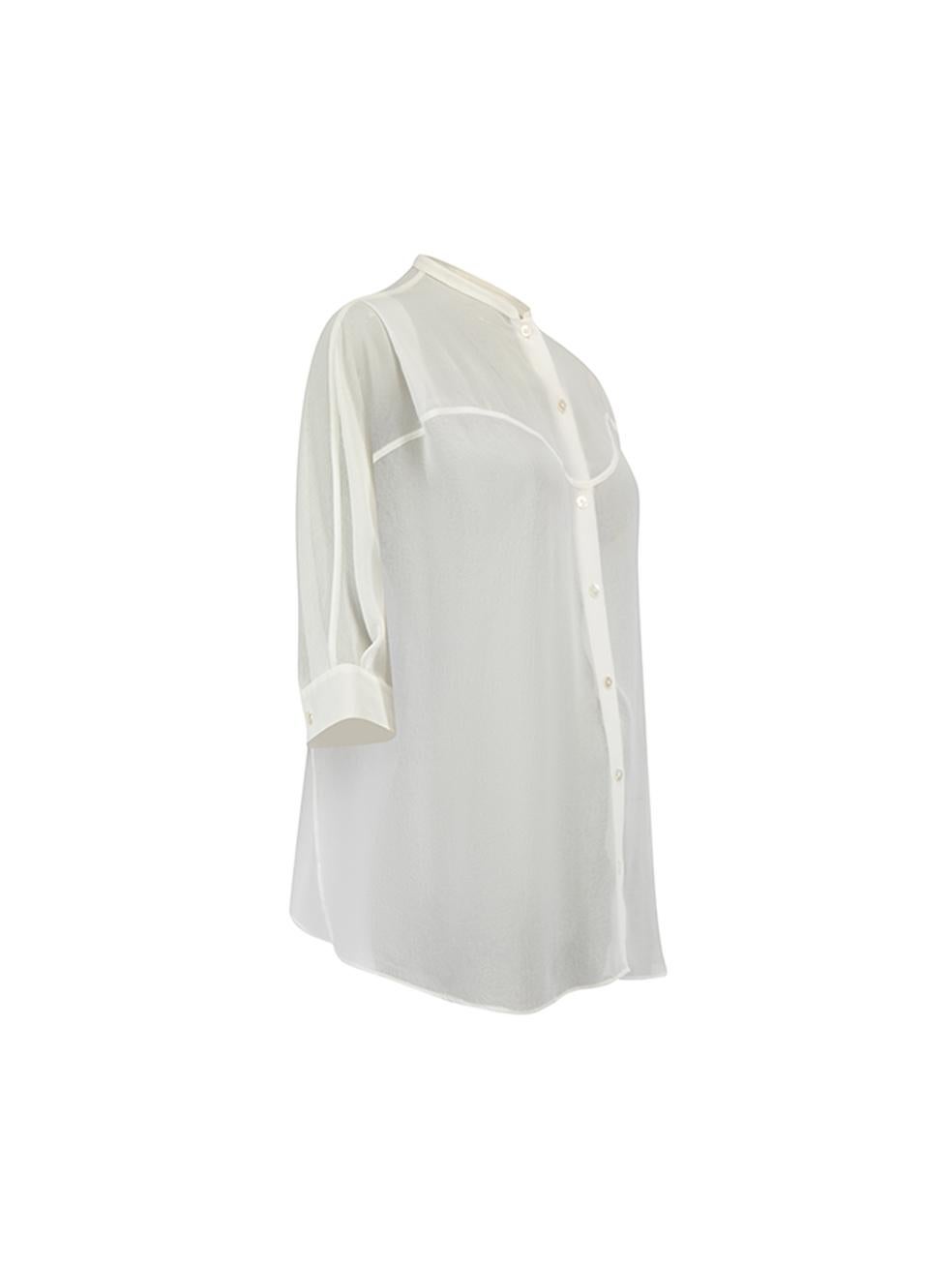 CONDITION is Very good. Minimal wear to blouse is evident. Minimal wear to exterior fabric where loose thread can be seen on this used Acne designer resale item.  Details  Cream Chiffon Blouse Front button up closure Mid sleeves Buttoned cuffs