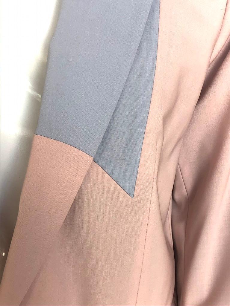 This is a fashion it-girl's blazer. The contrasting pastel hues are chic and effortless. 