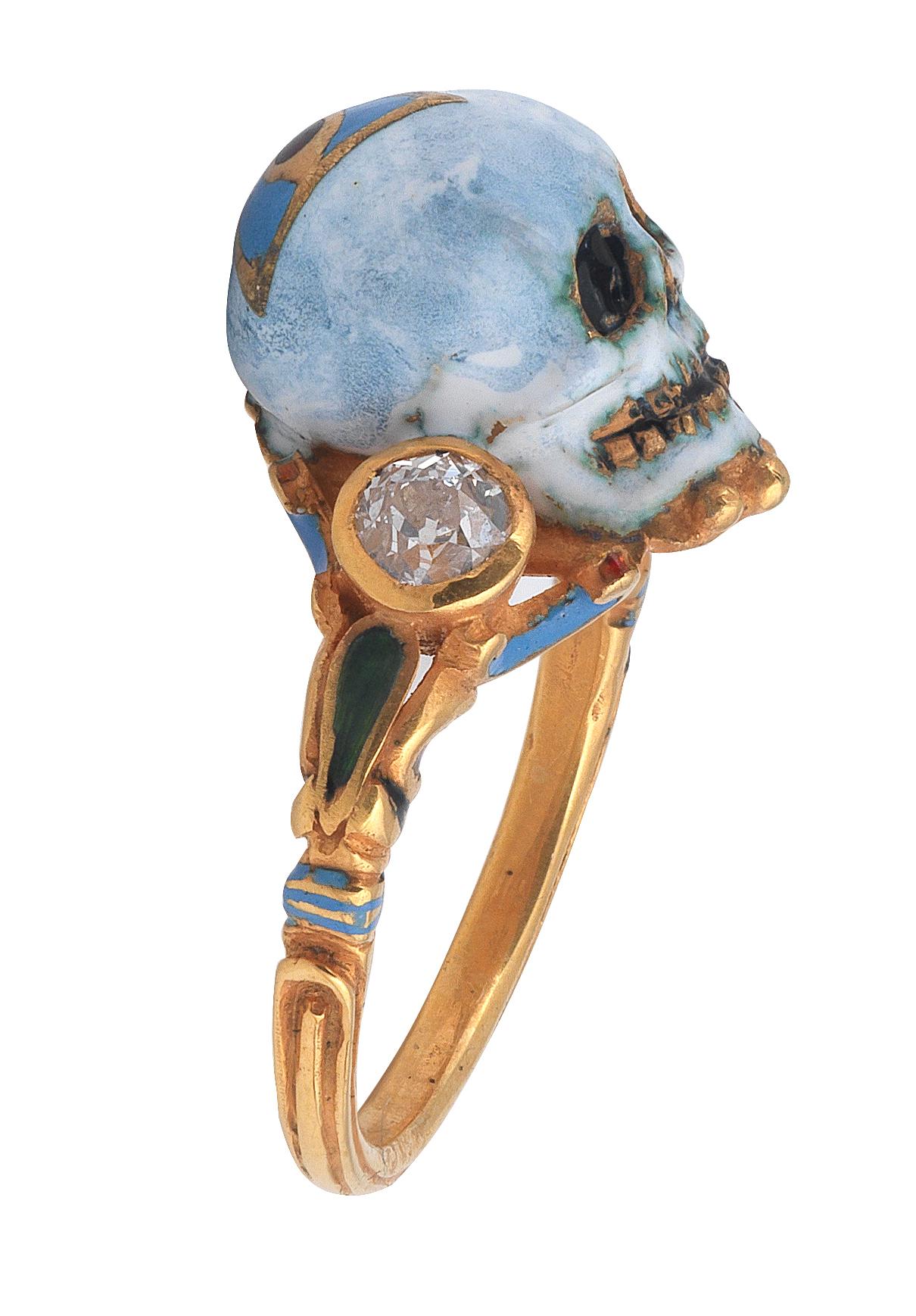 Renaissance style Memento Mori skull ring made with champleve multicolored enamels and old cut diamonds.
Mounted in 18Kt gold Signed A. Codognato Venezia Weight: 7,5 gr Finger size: 6 3/4