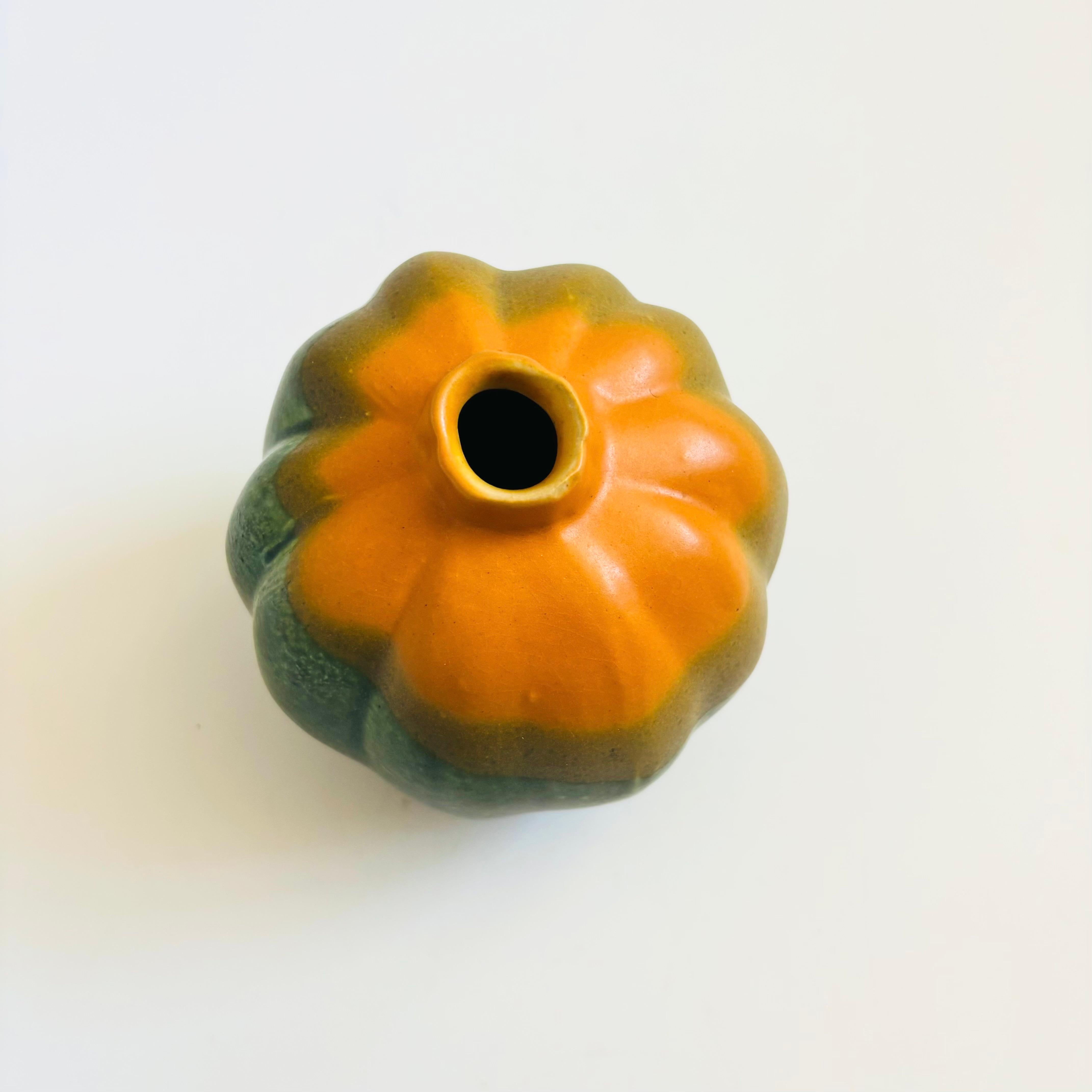 A vintage studio pottery vase in the shape of an acorn squash by Patricia Garrett of Berkeley, California. Part of her 