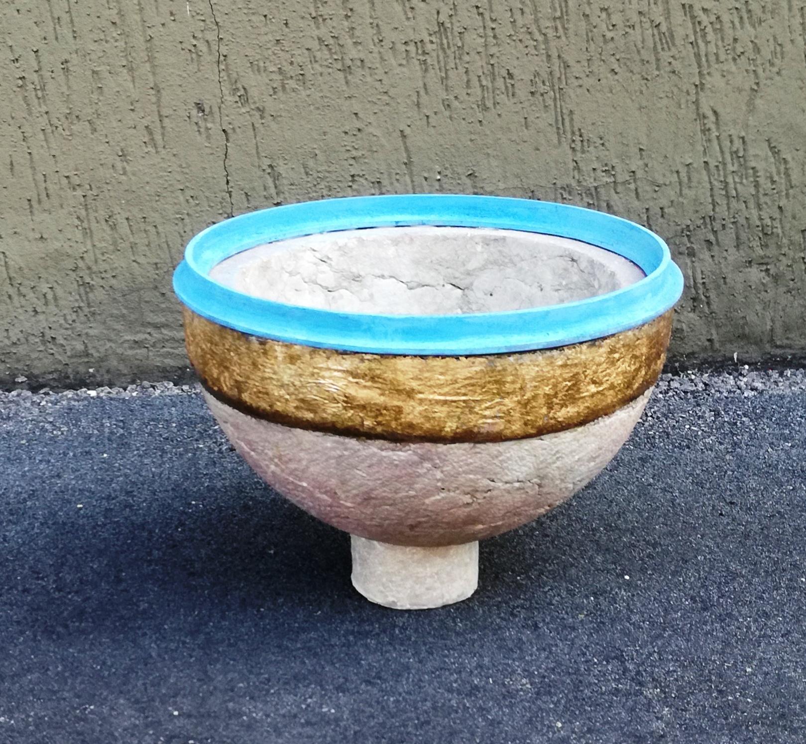 small Jerusalem stone stoup, transformed into a sculpture by master Valter berni. the bowl was originally chipped and ruined, Valter's intervention made it possible to derive a small jewel of art. gold leaf to coat the top edge, and iron ring