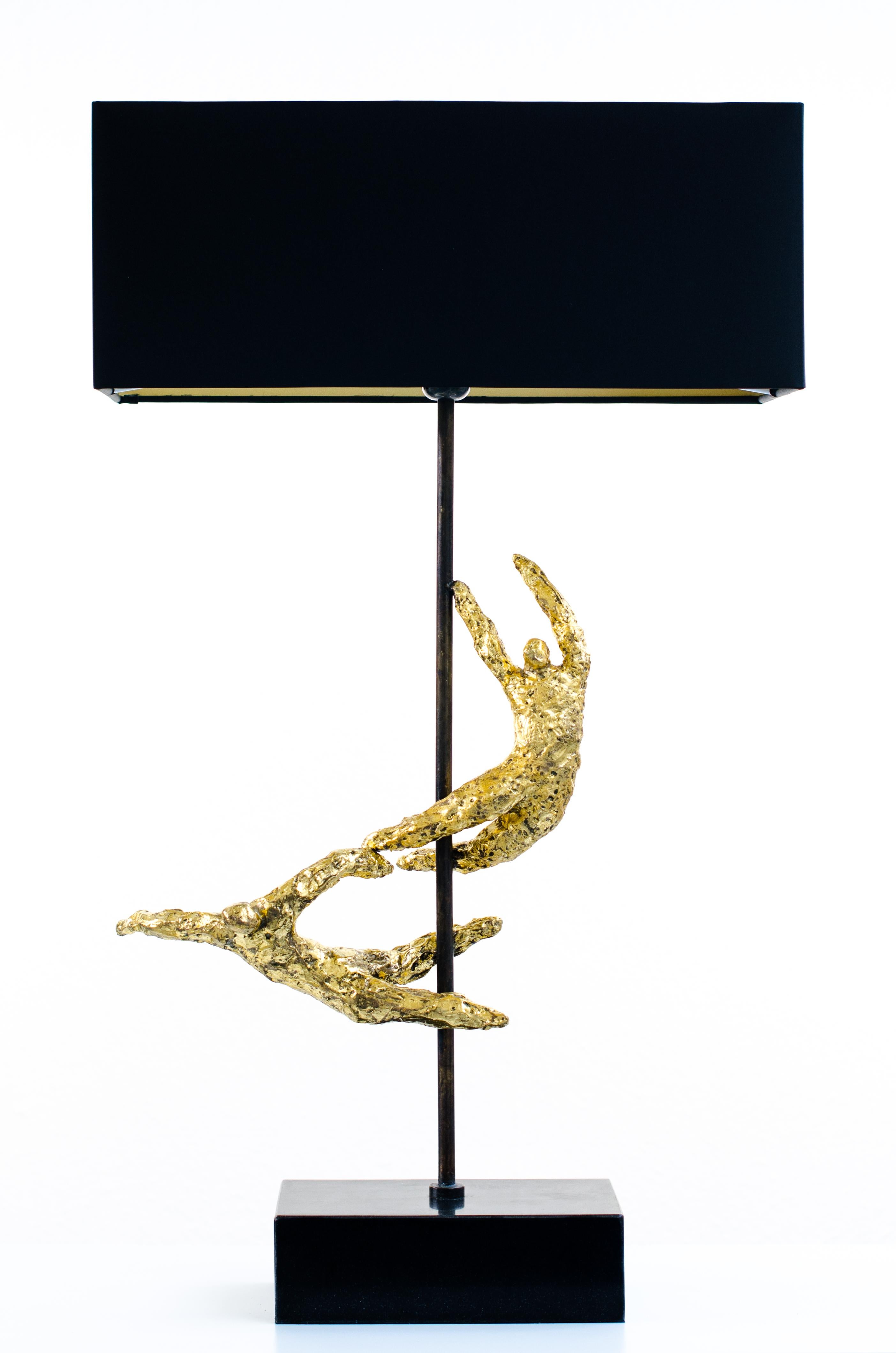 'Acrobats' Bronze Sculptural Table Lamps set
Figurative sculptures that depict the agility and robust strength of the acrobats where the movement of the figures brings the sculpture to life. Constructed in what seems to be a gravity-defying