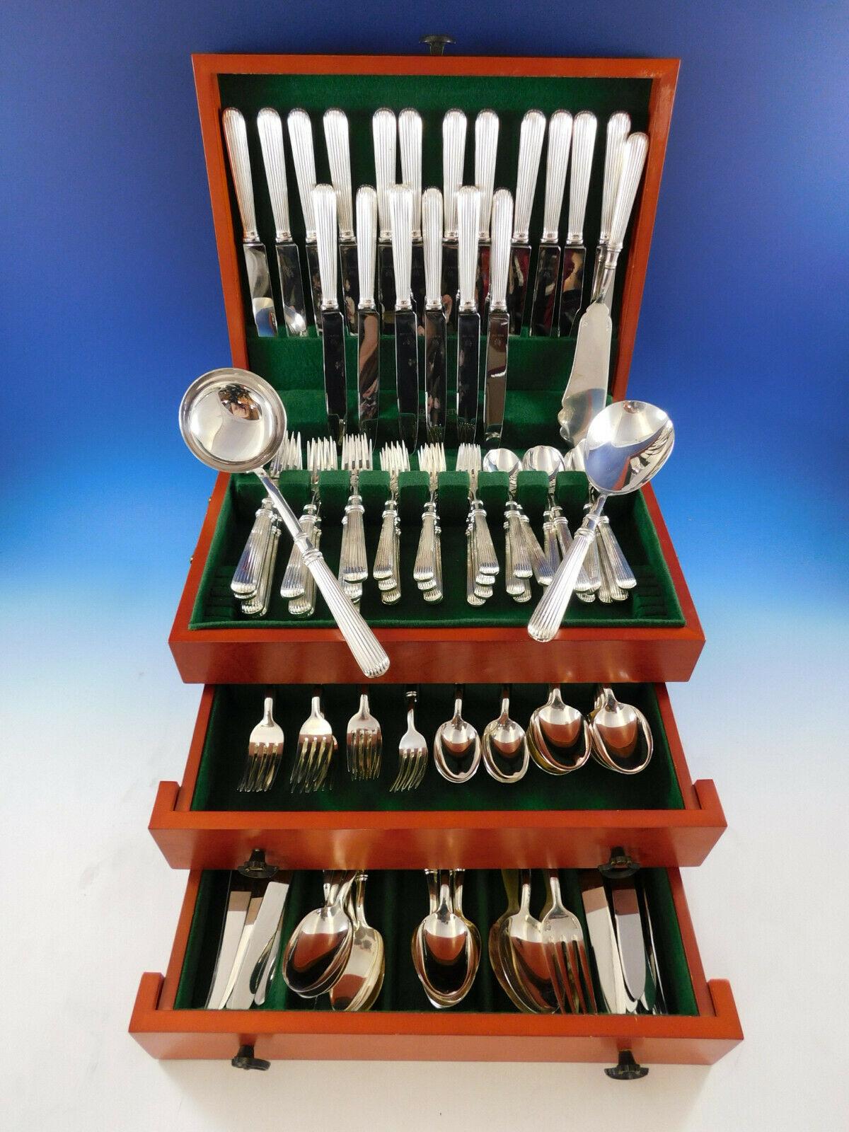 Superb dinner size Acropole by Cesa 1882 Italy 800 silver flatware set, 115 pieces. All of the pieces have hollow handles with a modern design of vertical ridges. This set includes:

18 dinner size knives w/pointed stainless blades, 9 3/4