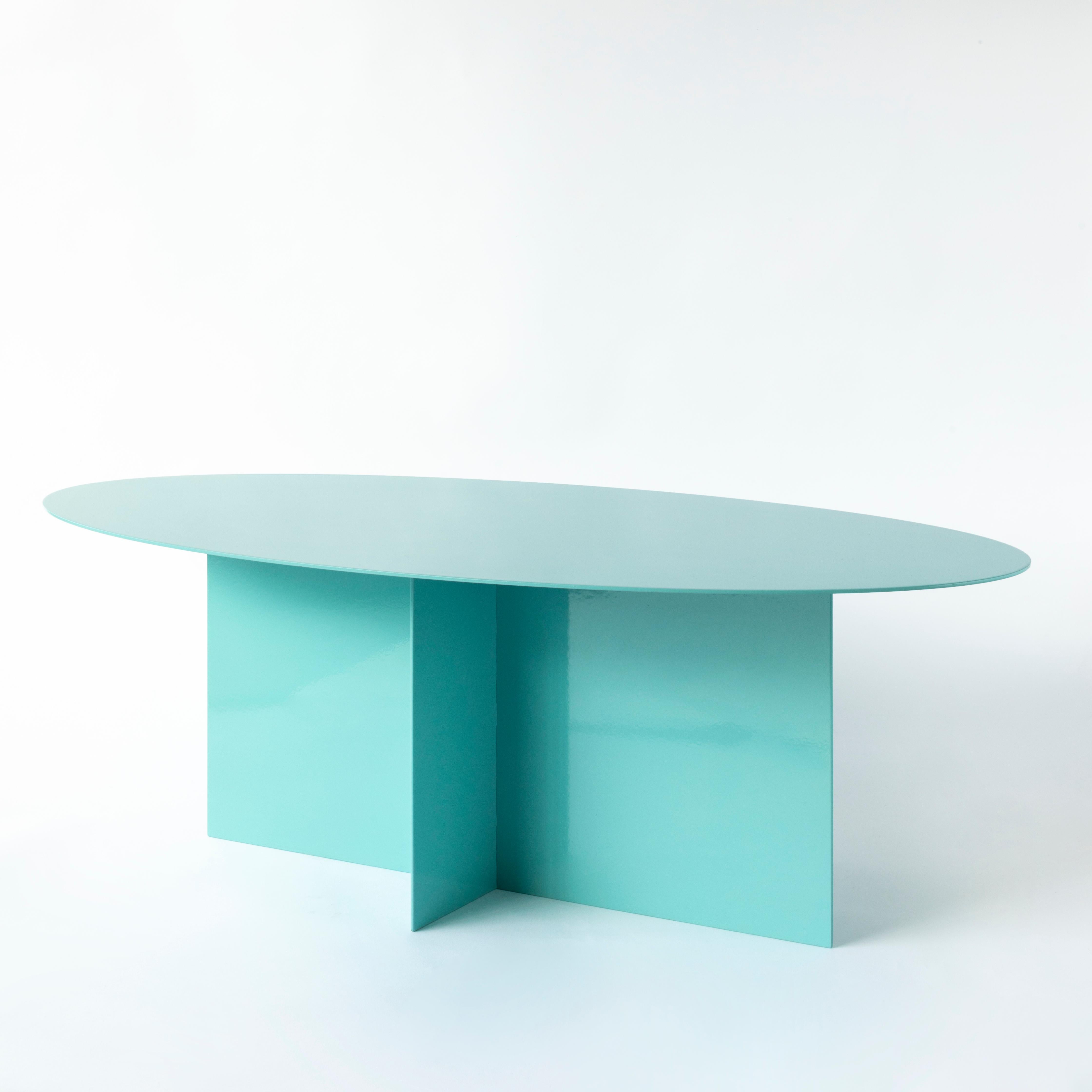 An iron origami that seems light, a game of cross shaped forms and surfaces of any geometric shape define this collection of tables, characterized by a feature common to all my protects: colour.
The cross shaped base fits any shape of top, all