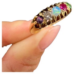Akrostichon ADORE Ring Viktorianisch 18ct Gold Amethyst Diamant Opal Rubin und Smaragd