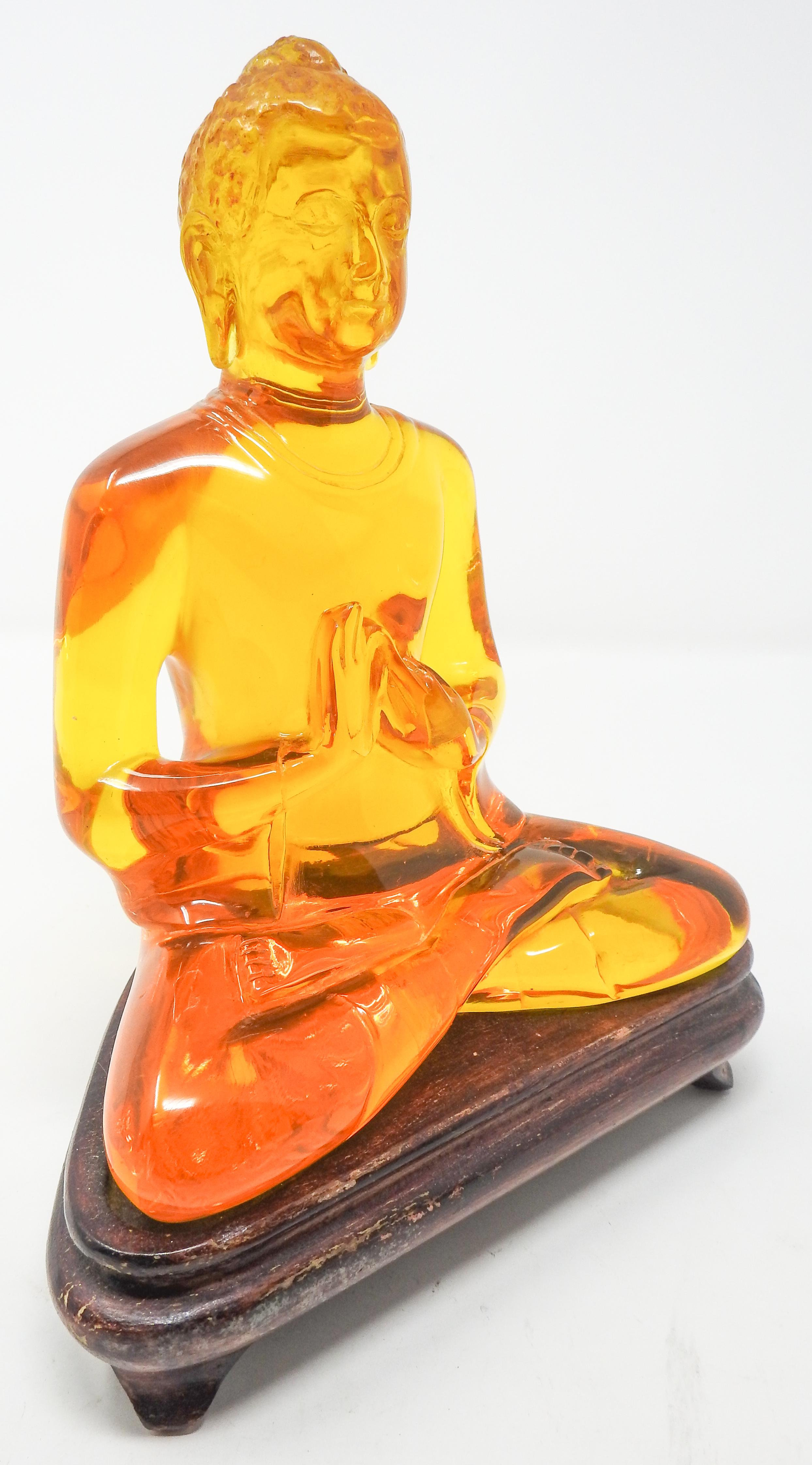 amber buddha statue