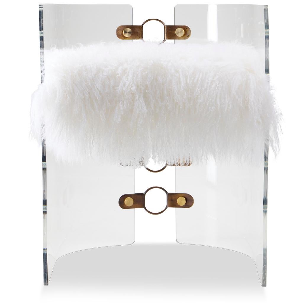This futuristic dining chair features a clear Lucite acrylic shell structure in two sections. These sections are connected by a bronzed steel bracket with decorative rings that create an eye-catching back spine. Viewed from behind, the chair reveals