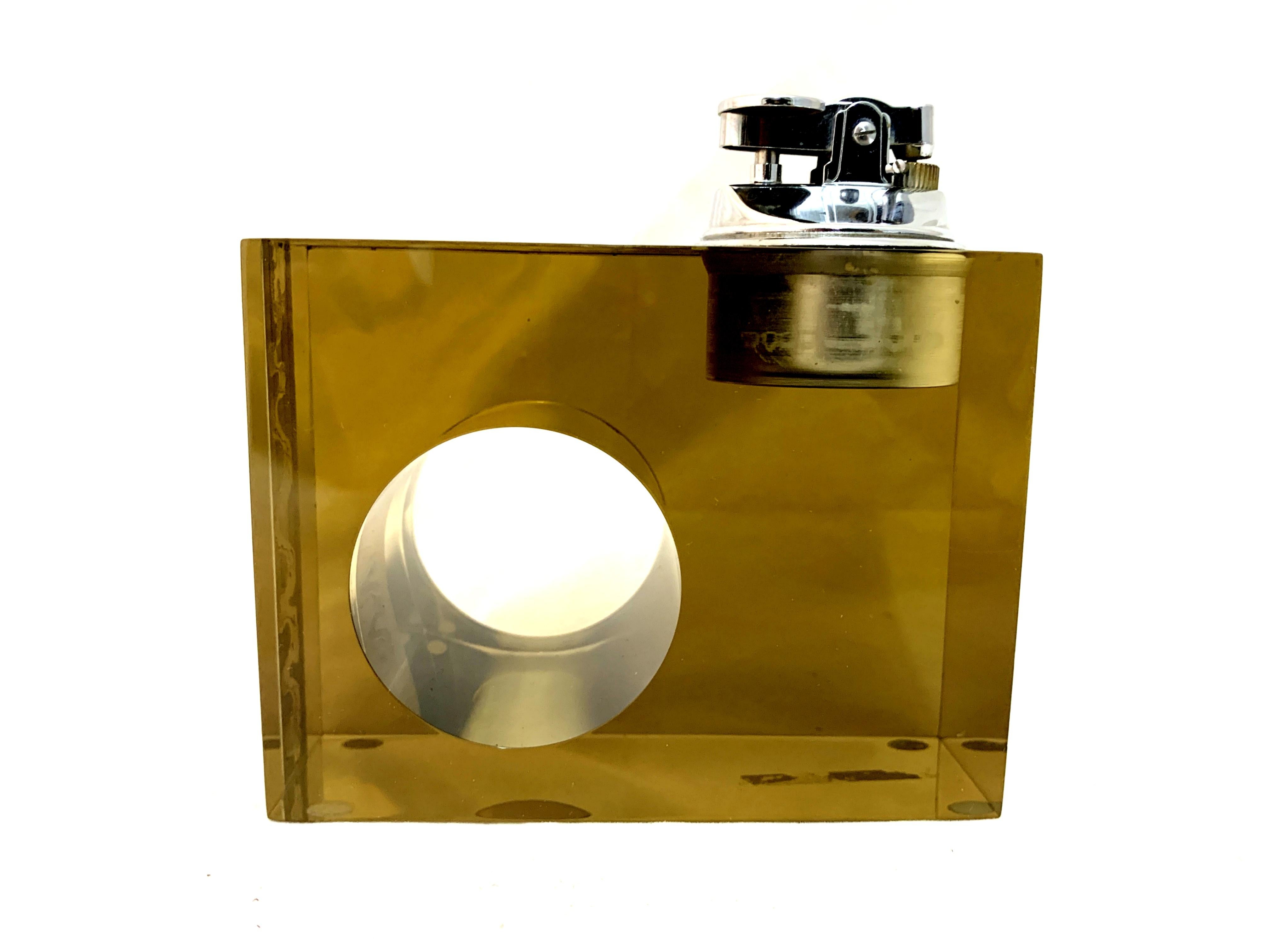 Acrylic or Lucite cigar lighter with a mark 800 silver band. Generally good condition, lighter is needs refill etc.