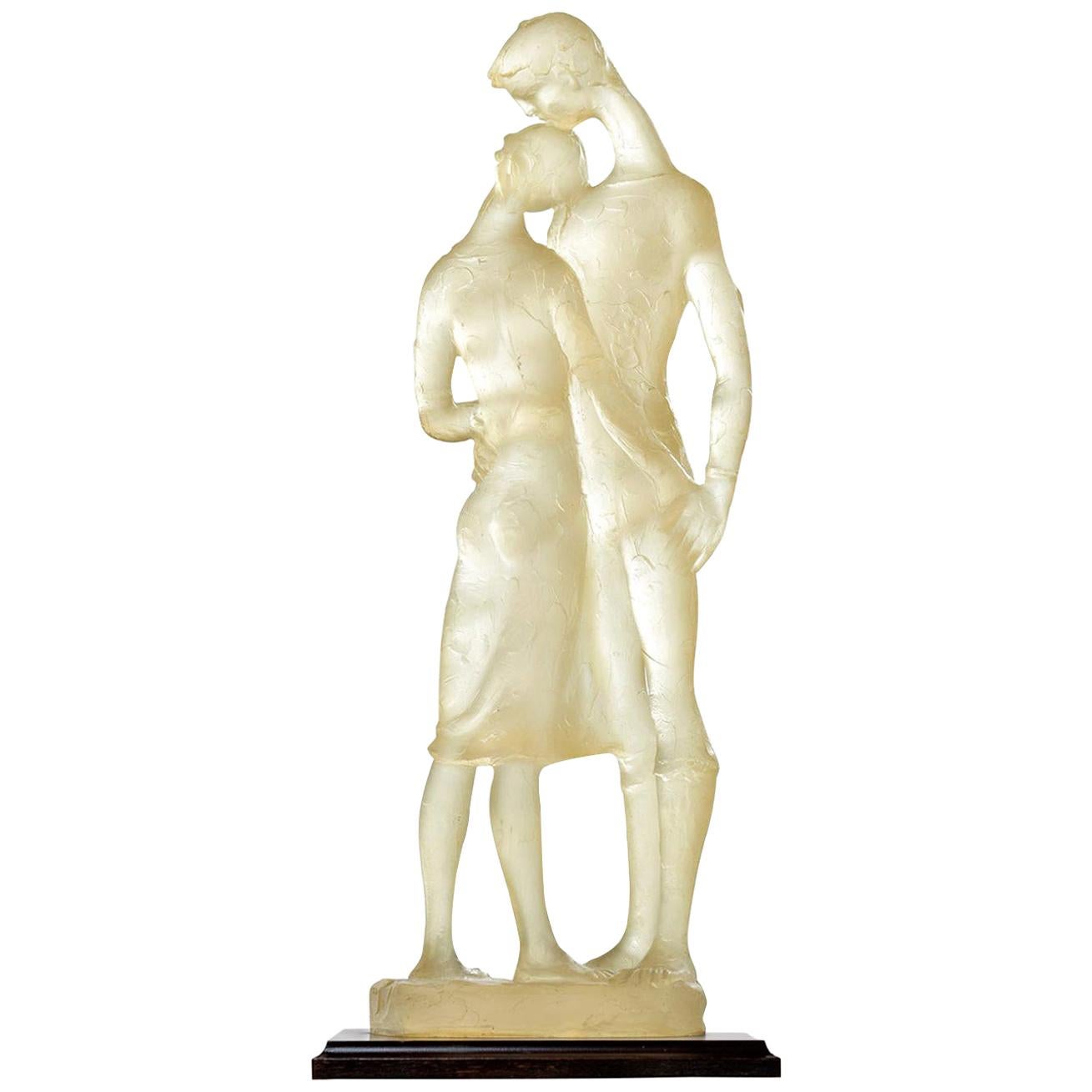 Beautiful man and woman in tender embrace. Slightly elongated modern figural sculpture formed in a clear resin and mounted to a wood base. 

Although clearly numbered and stamped, our staff was incapable of uncovering the artist or manufacturer.