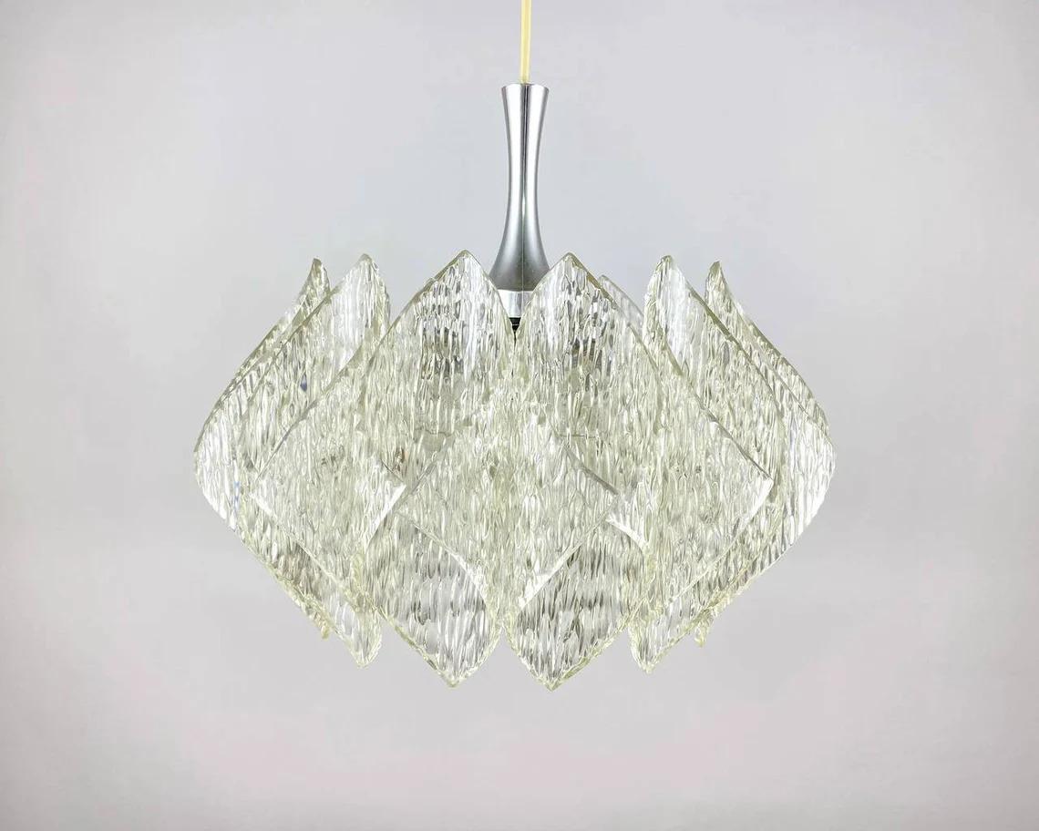 Attractive vintage chandelier from the company ME Marbach Leuchten from Erbach in the Odenwald, producer of many iconic lights.

A classic designer piece from the 50s/60s by Marbach is the splendor of the chiseled edges of Plexiglas, which is used