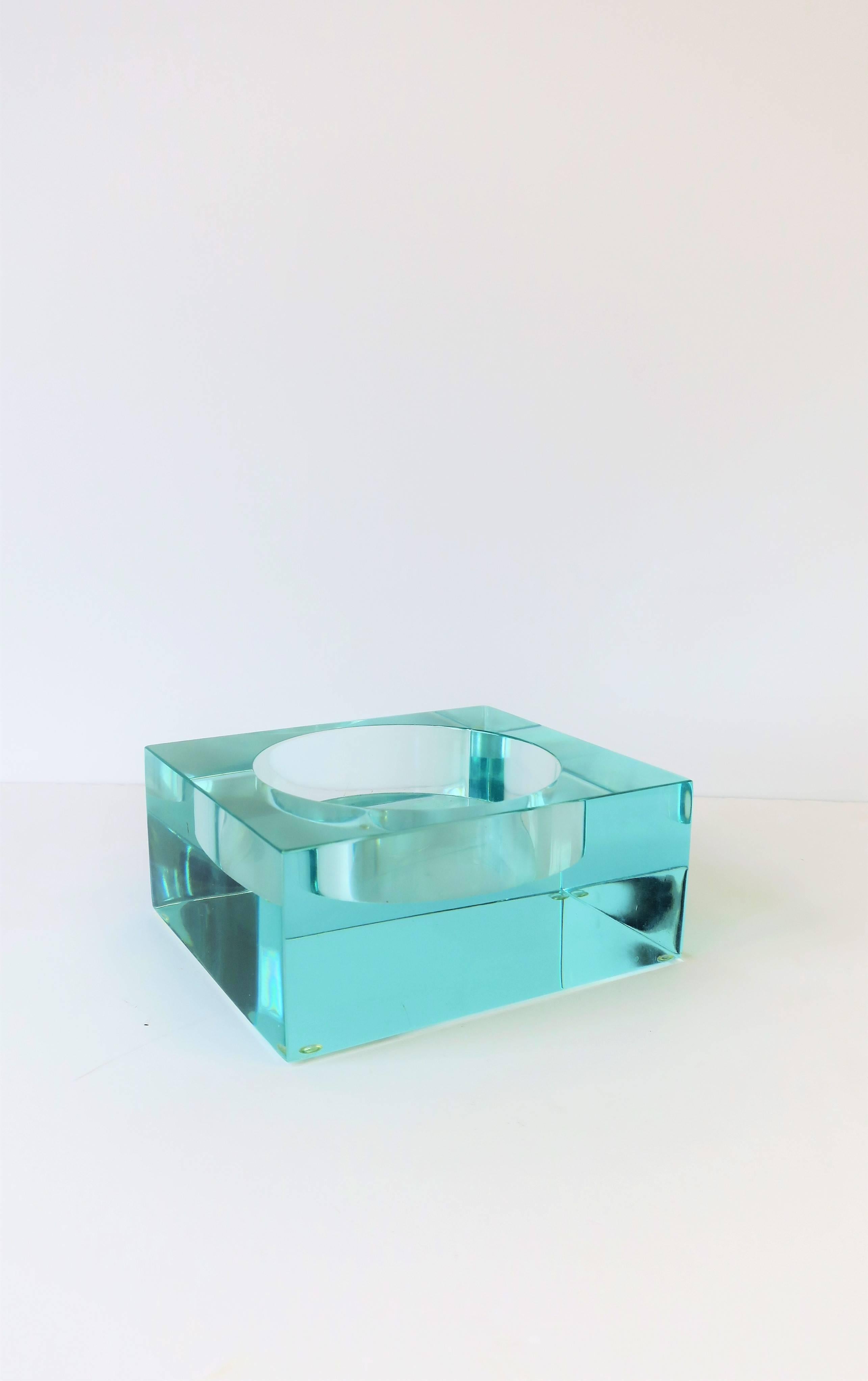 A beautiful Modern style, Post-Modern or contemporary vessel, bowl or vide-poche (catch-all), in 'glass' acrylic or Lucite. Piece is made to look like a thick and substantial glass vessel, however, piece is acrylic/Lucite. Beautiful as a standalone