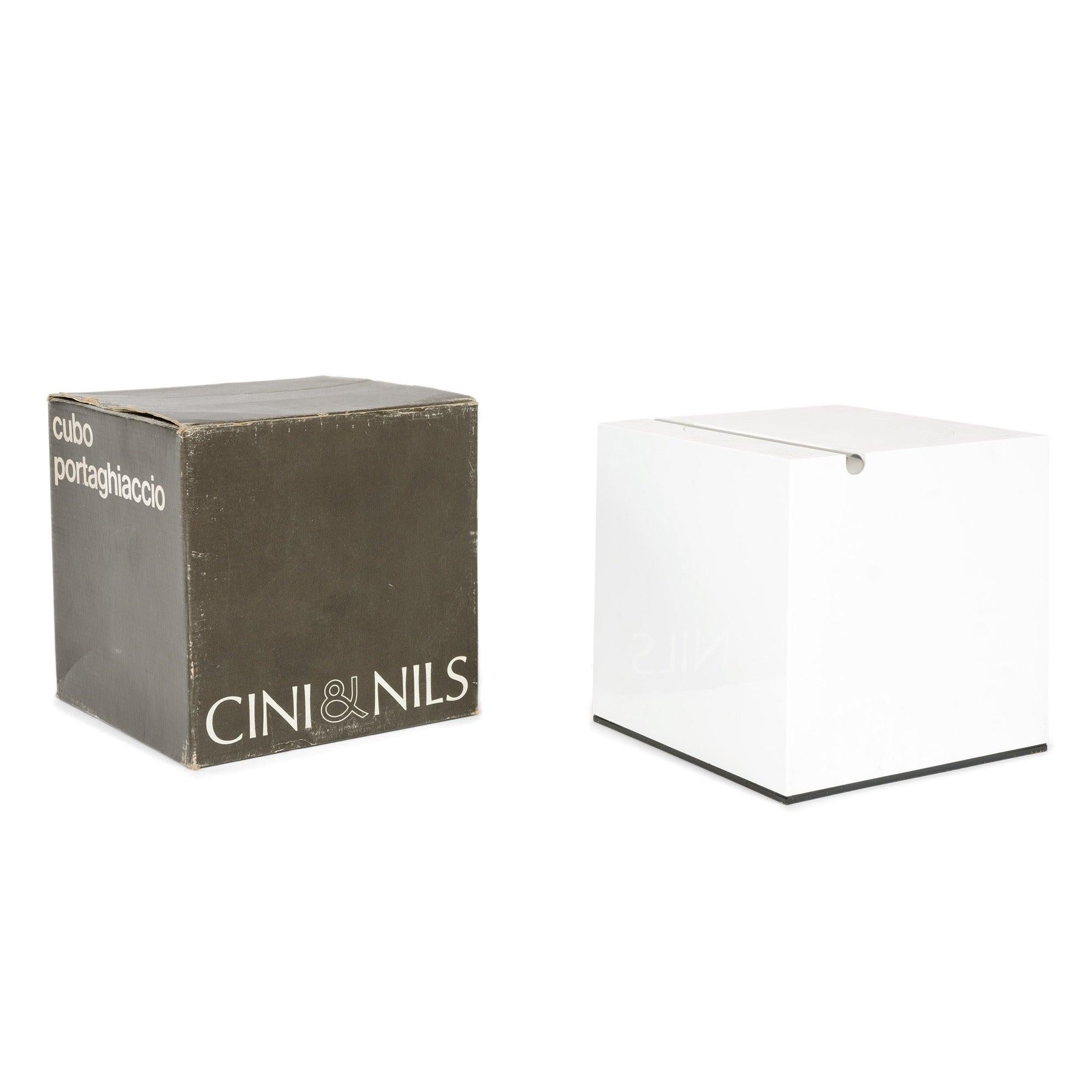 A acrylic cube-form ice bucket, with a stainless steel hinge, and a round flip-top lid in original box.