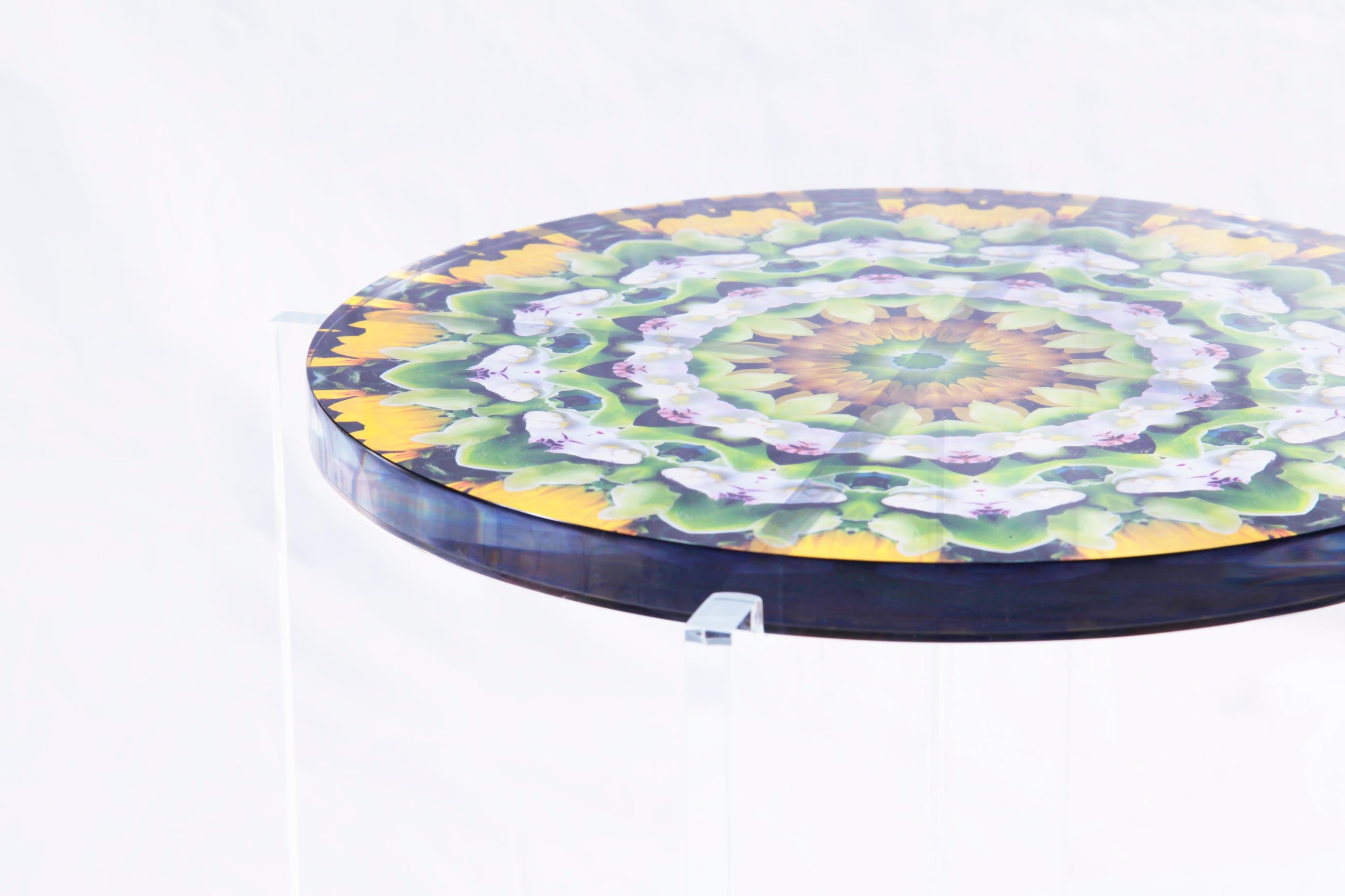 Mandala ‘bouquet tables’ bring a burst of colour & spiritual optimism. Designed by luxury lifestyle brand JG Home, these unique bouquet mandala tables flood any urban setting with a burst of floral vibrancy. 
Made from high quality PVC, the modern