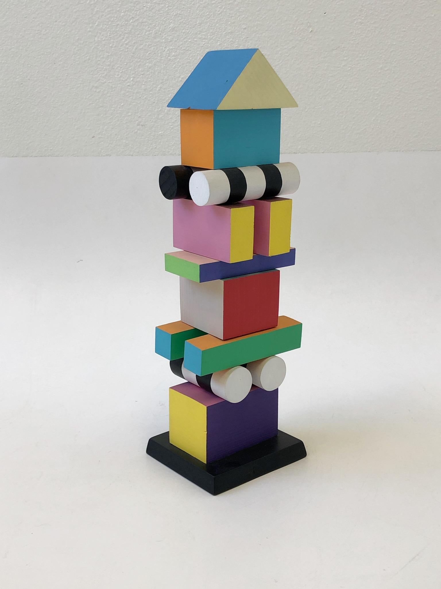 A beautiful 1980s Memphis style Sculpture by Artists Todd Gray. The sculpture is title “TOTEM” number 17/250 and signed by Todd Gray.
Dimensions: 17.75” high 5” deep 5.5” wide.