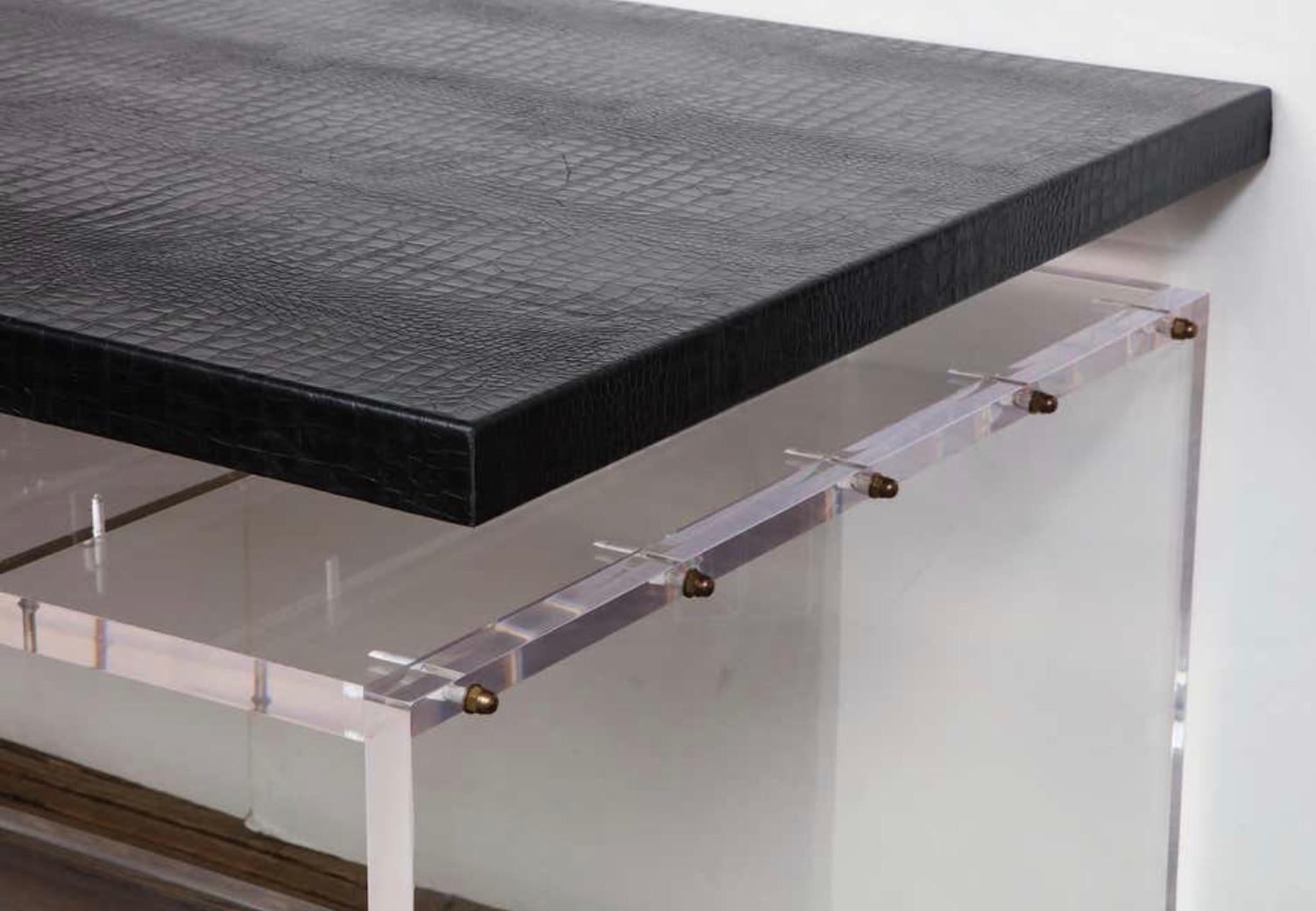 Black embossed crocodile leather desk with acrylic base. 

Made to order. 

Customization is available in different sizes and COM (Customer Own Material) for the top. 1 floor sample shown in the images is available for immediate purchase for the