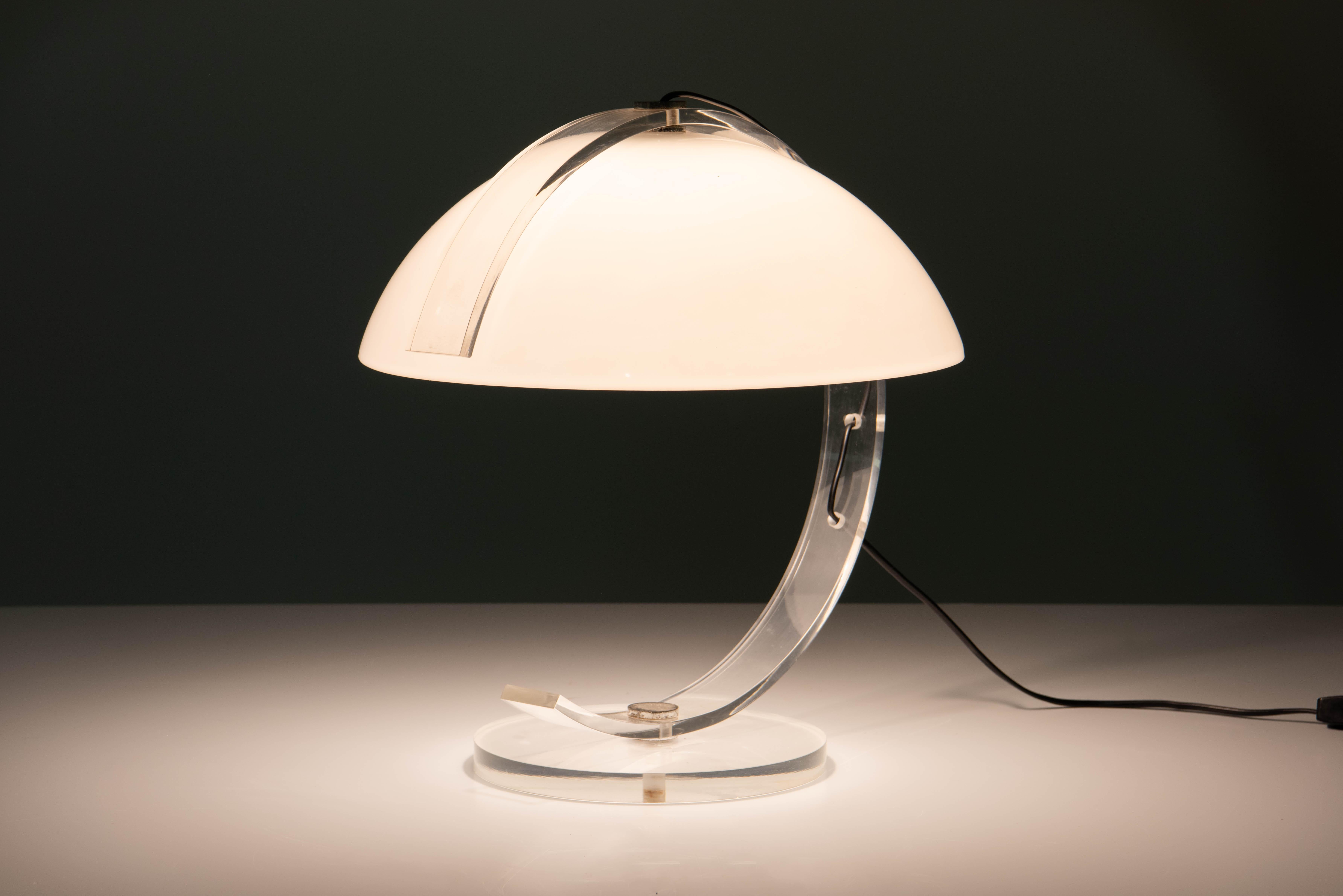 Rare clear and white plexiglass round mushroom lamp. E27 bulb socket. Slight patina to metal components of lamp.