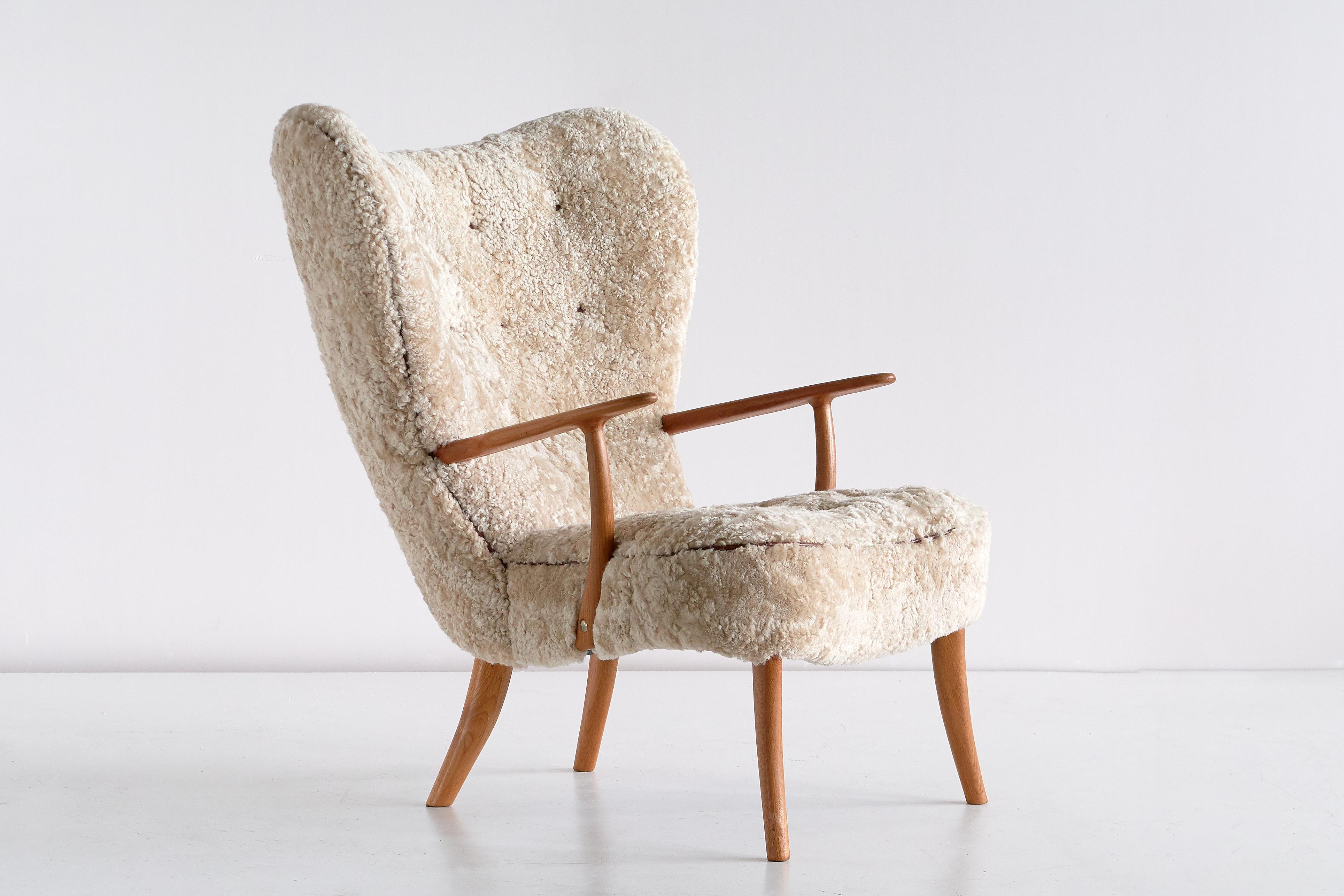 Scandinavian Modern Acton Schubell & Ib Madsen 'Pragh' Wingback Chair in Sheepskin, Denmark, 1950s