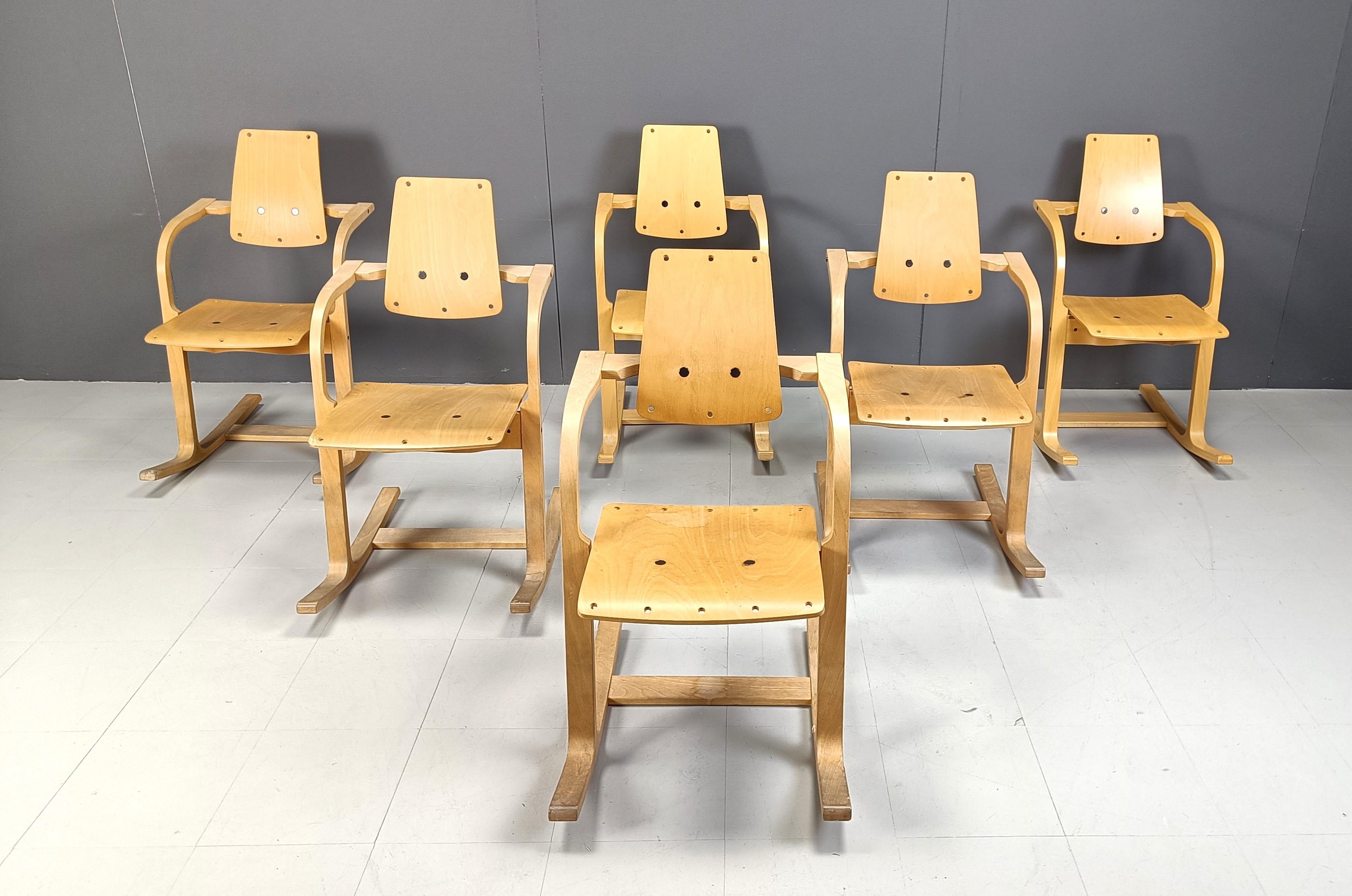 Set of 6 model Actulum dining/rocking chairs designed by Peter Opsvik for Stokke.

Designed in 1995.

These unique chairs have a beech wooden frame and a timeless design.

Stokke is known for its ergonomical designs.

Good overall condition

1990s -