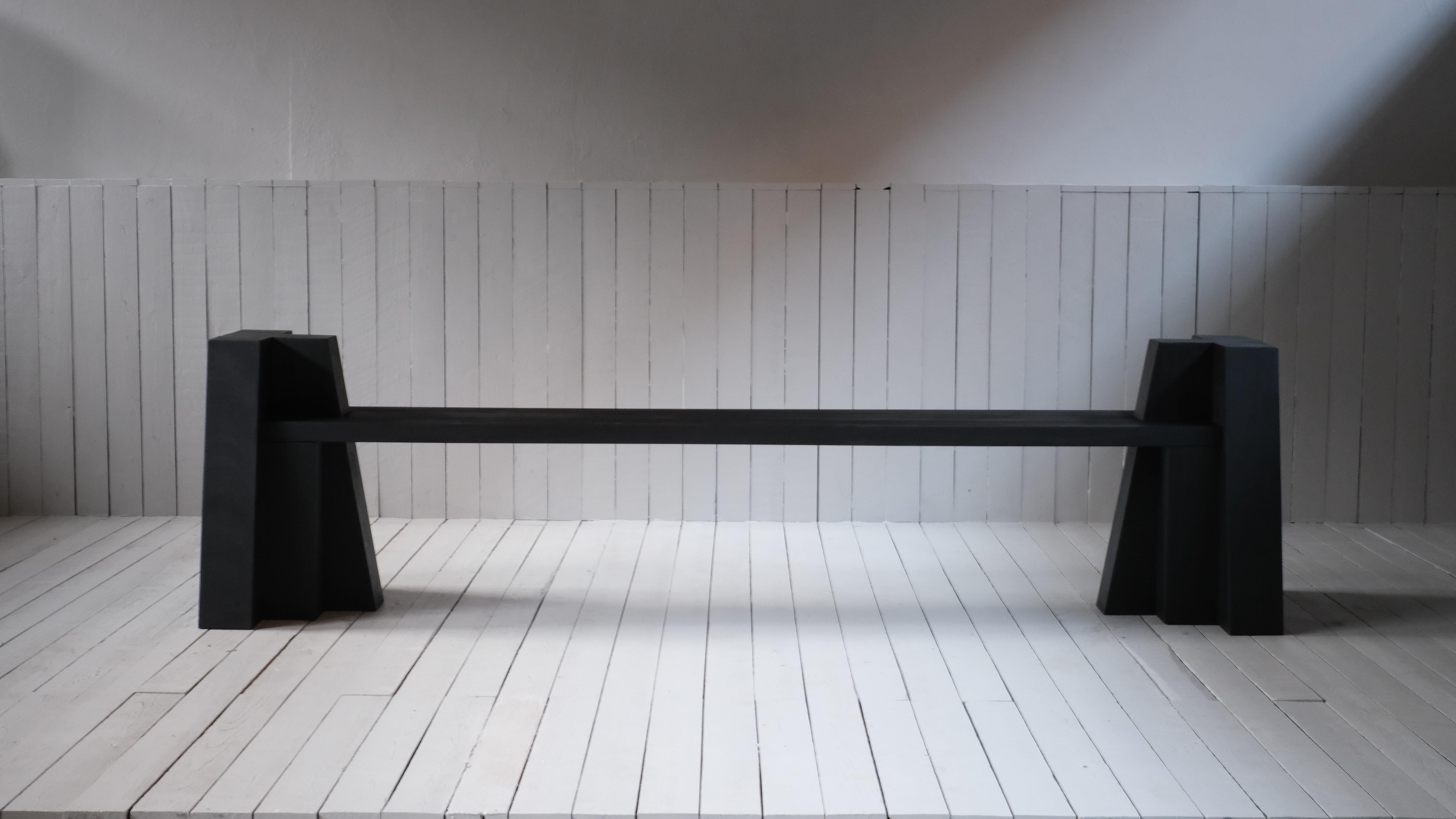 AD Bench in iroko wood by Arno Declercq
Dimensions: W 237 x L 60 x H 63 cm 
Materials: Burned and waxed iroko wood 

   

Arno Declercq
Belgian designer and art dealer who makes bespoke objects with passion for design, atmosphere, history and craft.