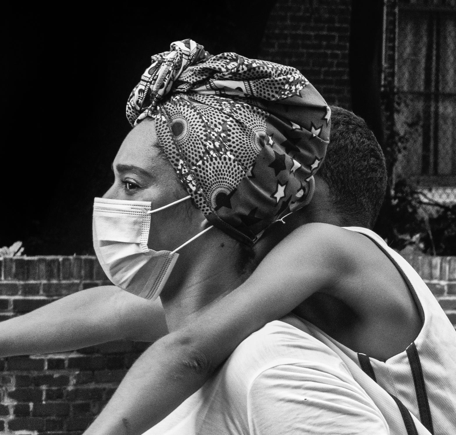 Do Better: Black Lives Matter city documentary photograph w/ mother & child - Realist Photograph by Ada Trillo